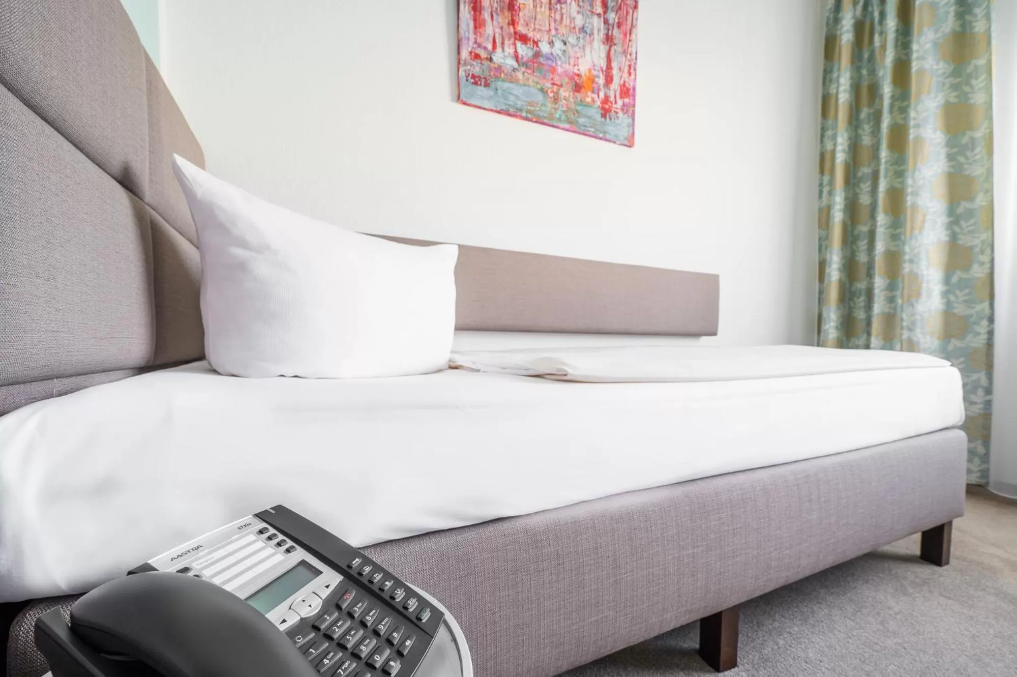 Bed in Hotel Kaspar Garni