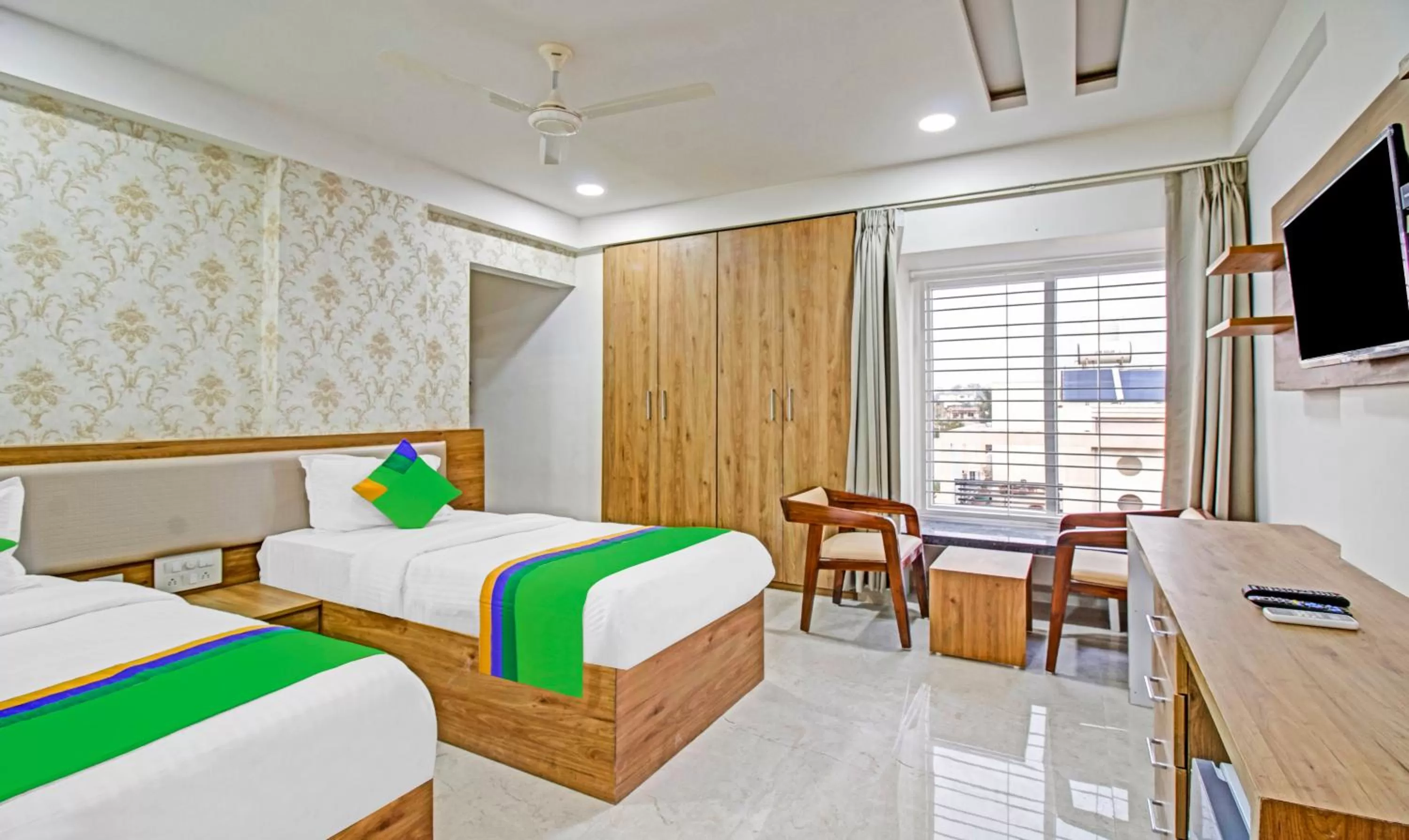 Bedroom, Bed in Treebo Chandraprasth Residency