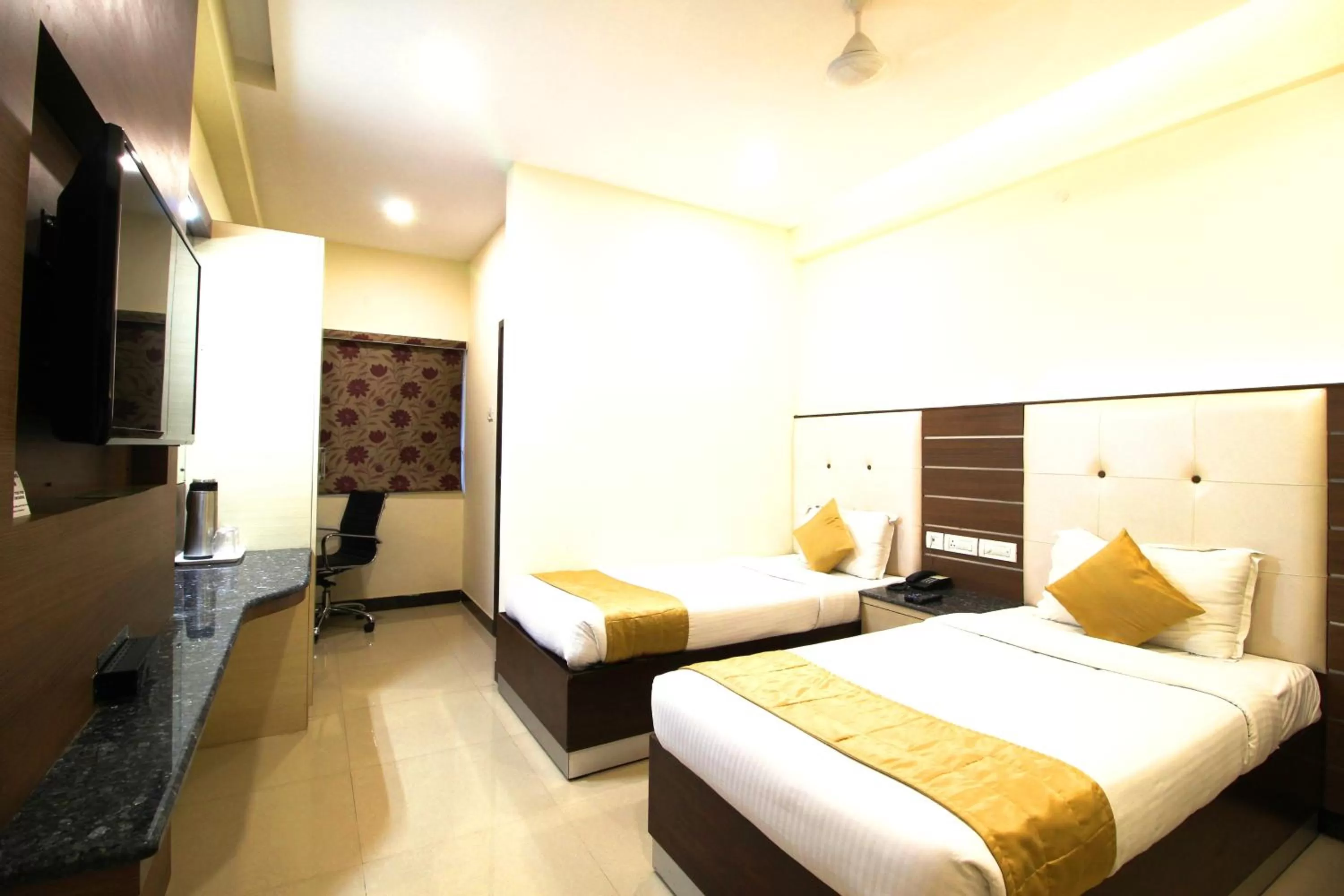 Bed in Saibala Grand Airport Hotel