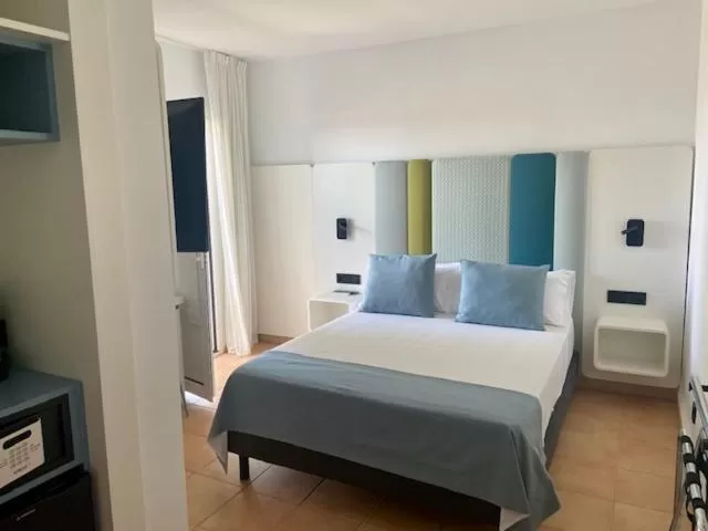 Bed in HOTEL BOUTIQUE CABO SUR