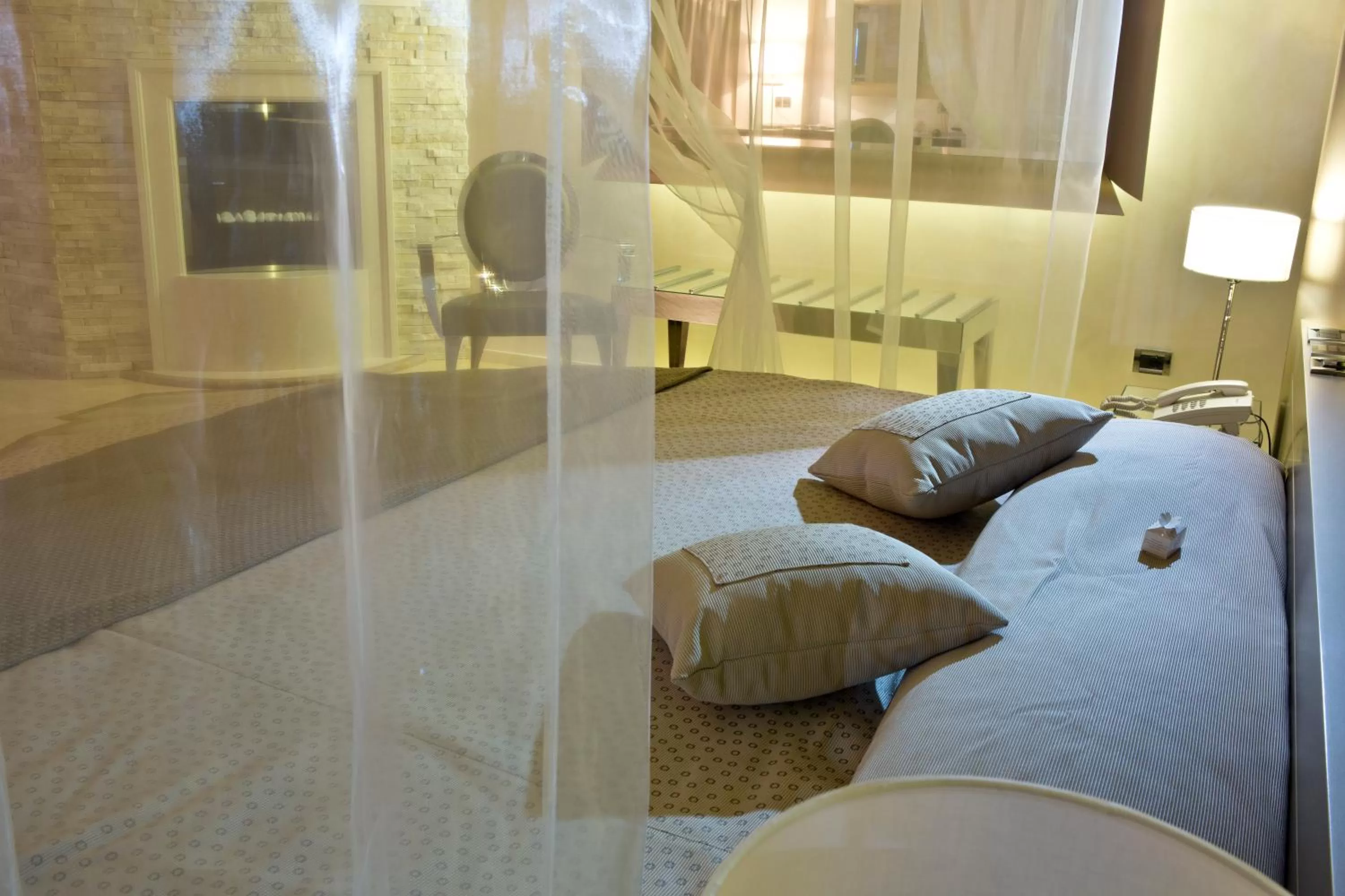 Bed in Vip's Motel Luxury Accommodation & Spa