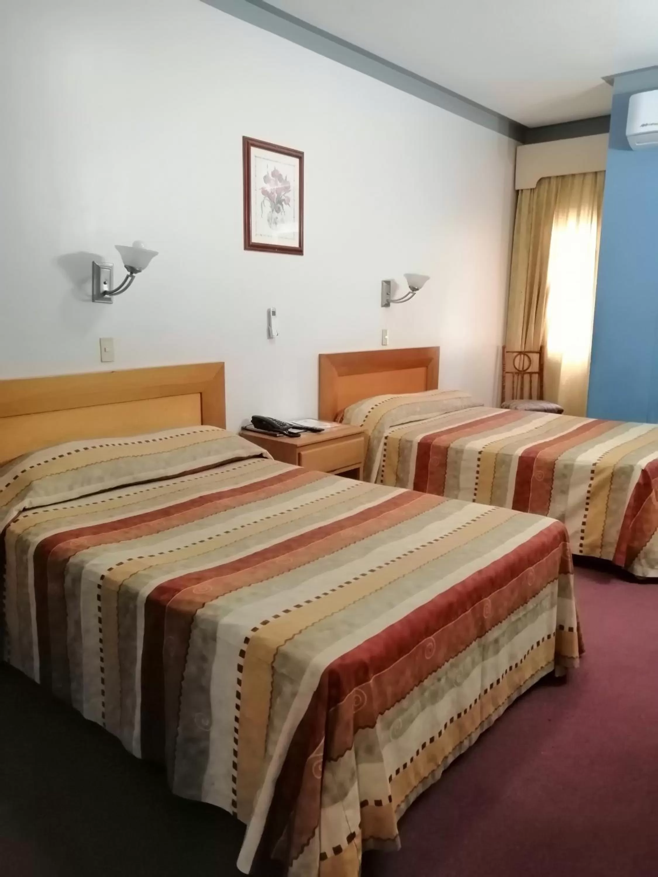 Bed in Hotel Astromundo