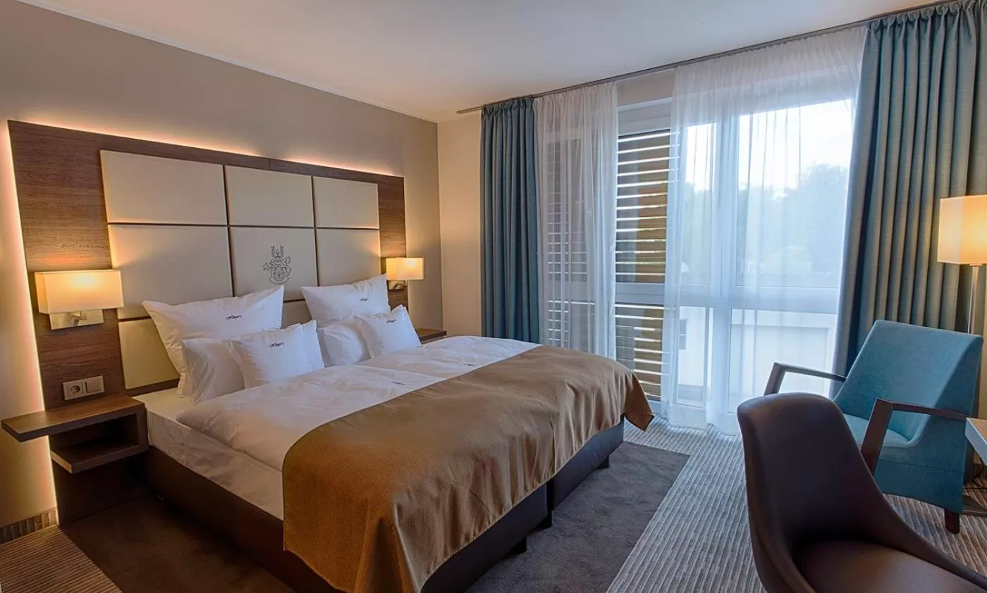 Photo of the whole room, Bed in Höger's Hotel & Restaurant