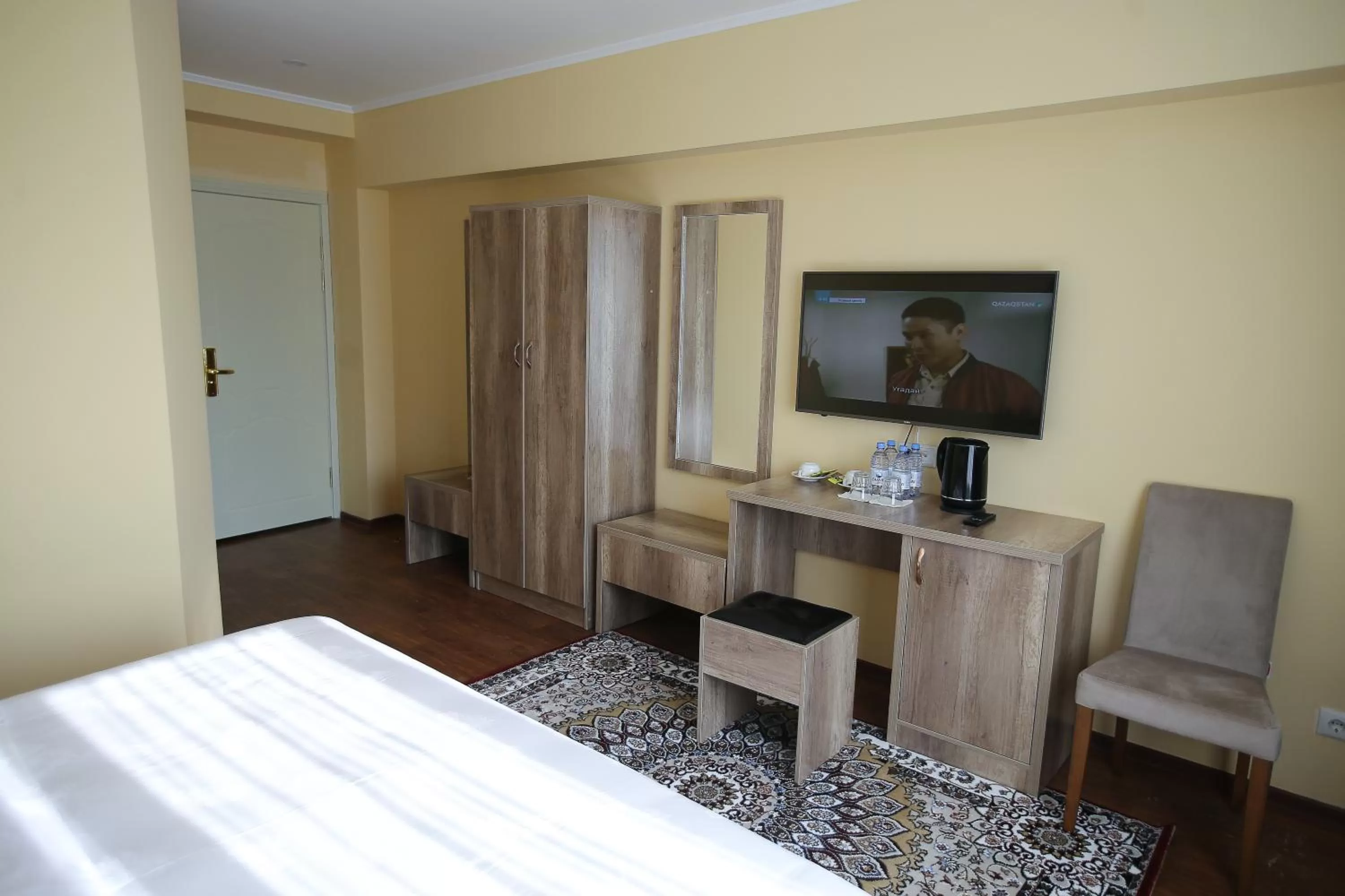 Bed in Altai Business Hotel