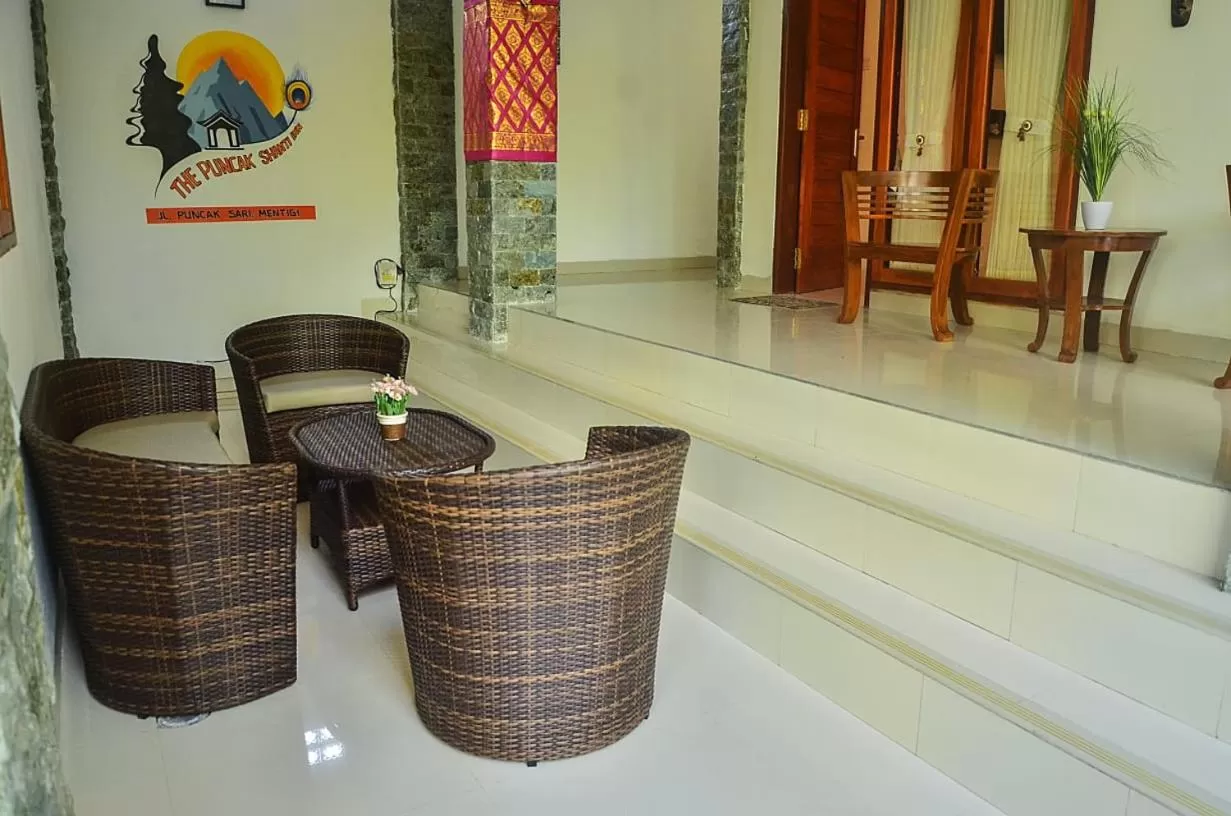 Living room in The Puncak Santhi Inn