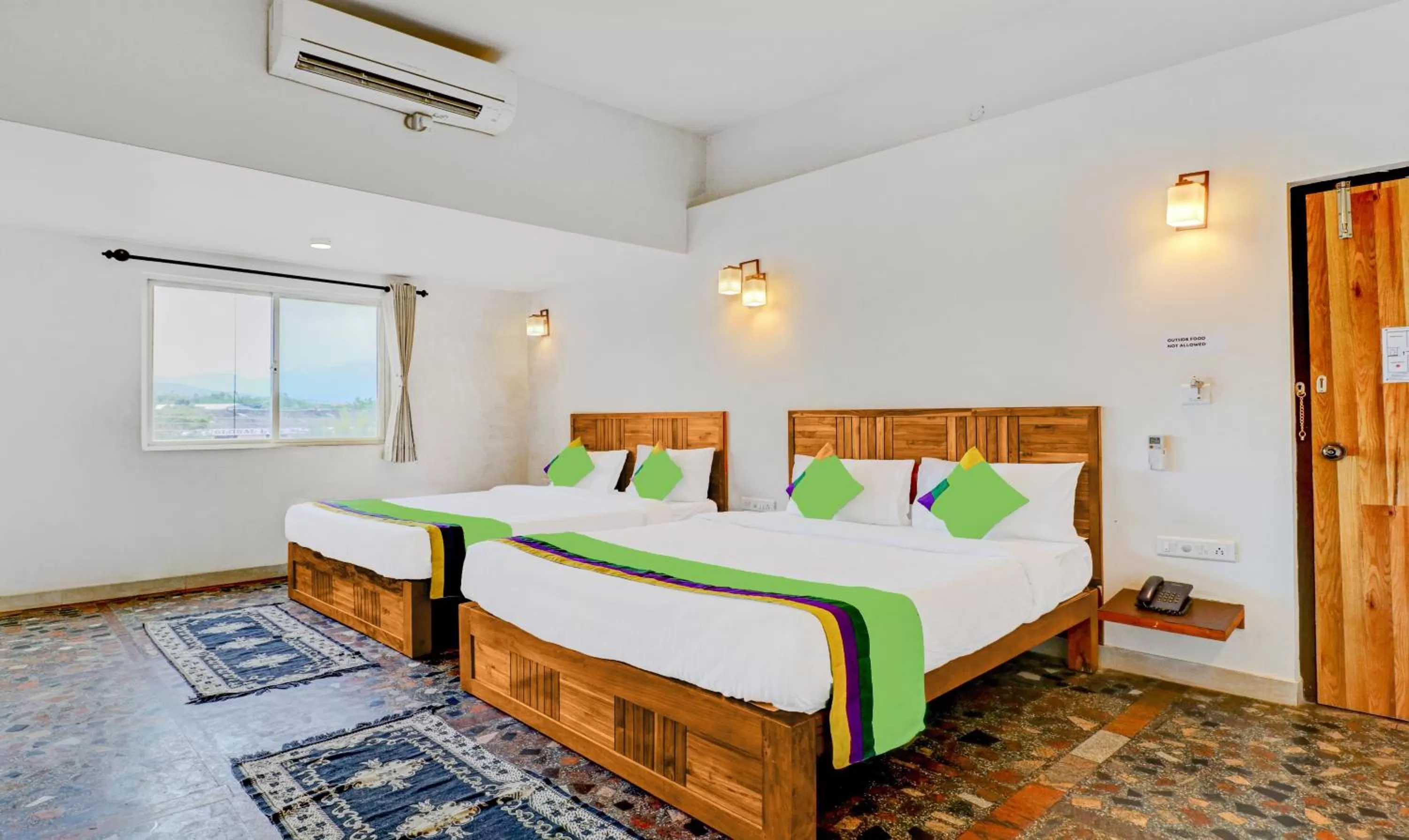 Bed in Treebo Benaka Residency