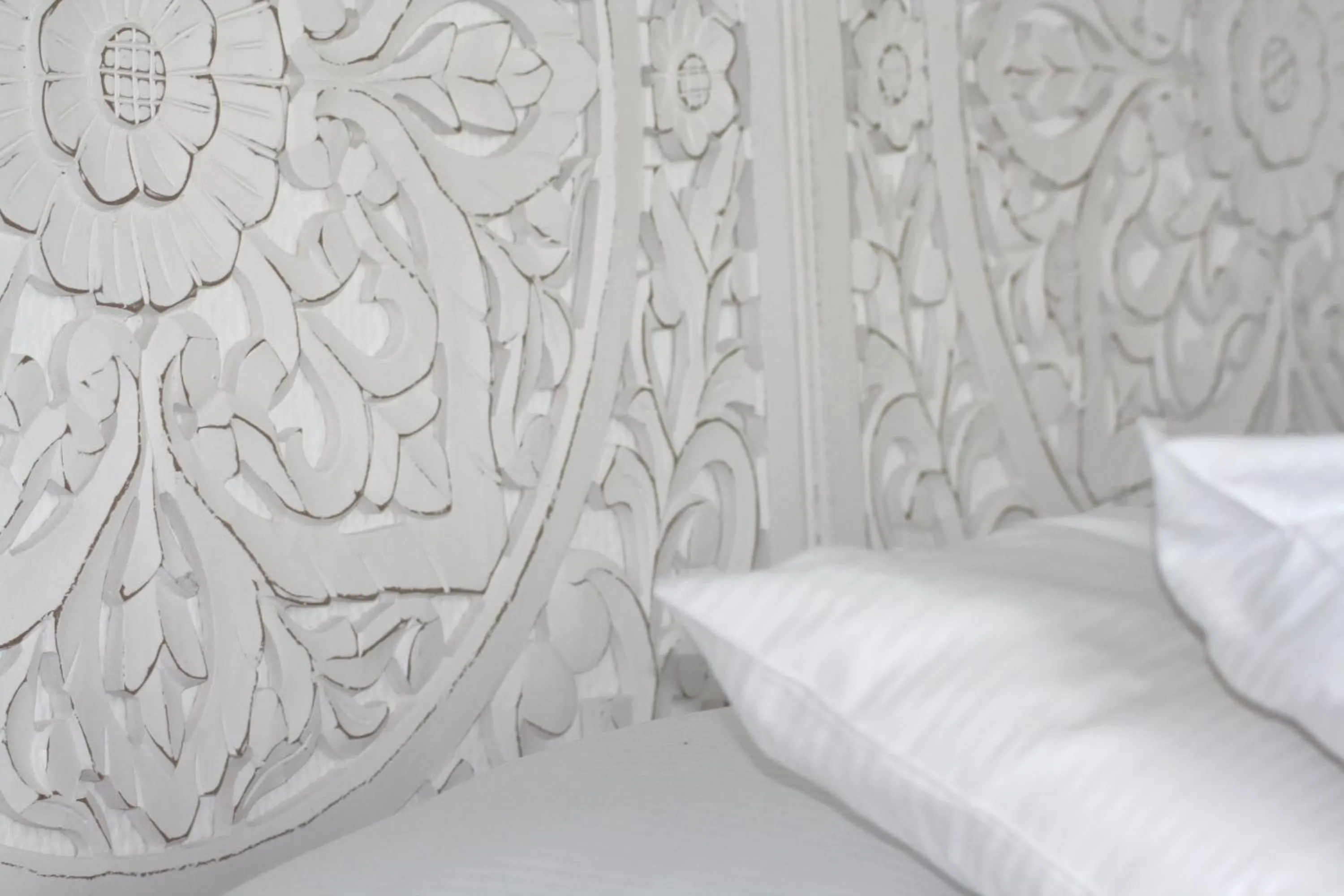 Bed in Logis Hôtel Sea View