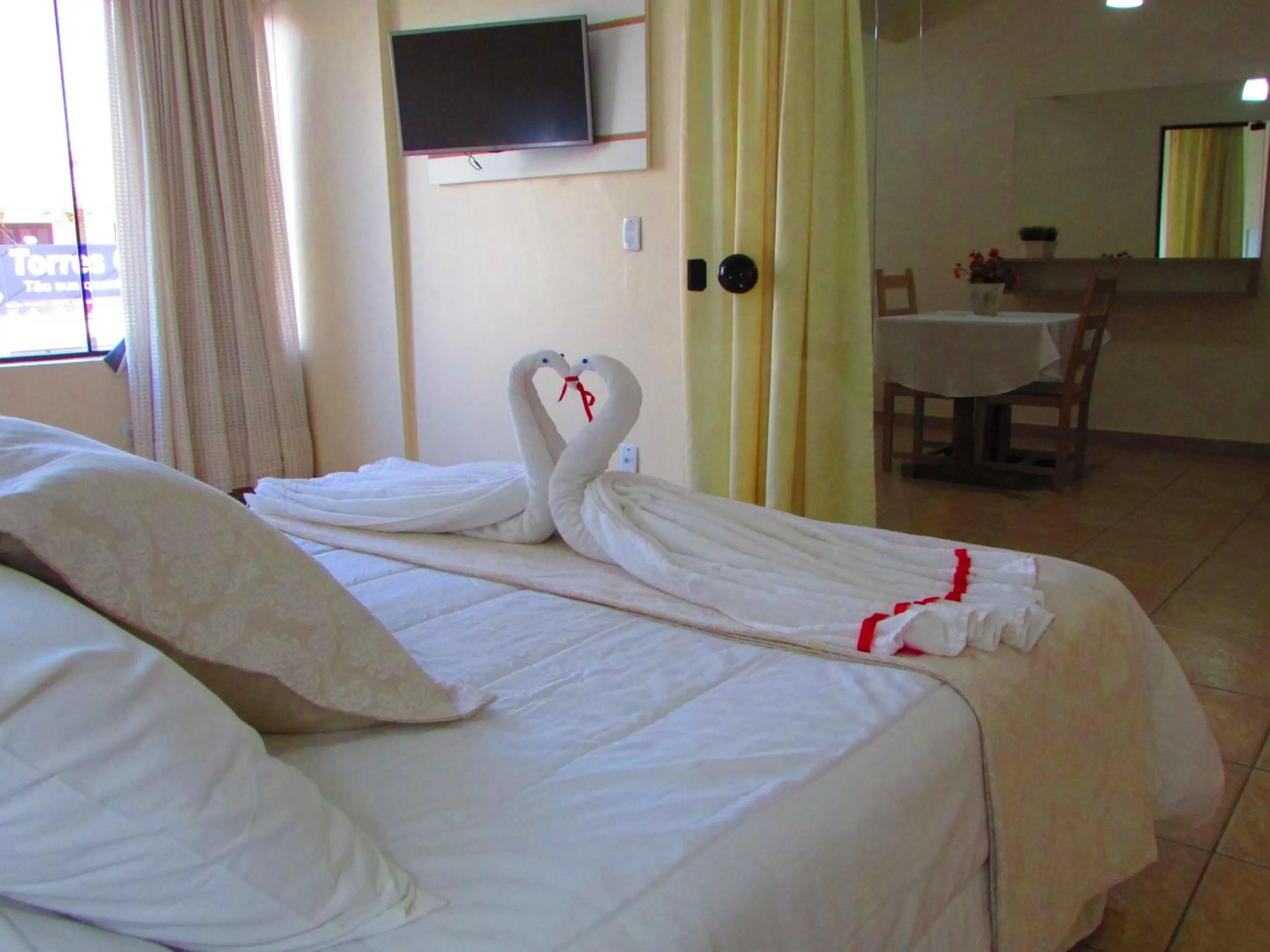 Bed in De Rose Palace Hotel