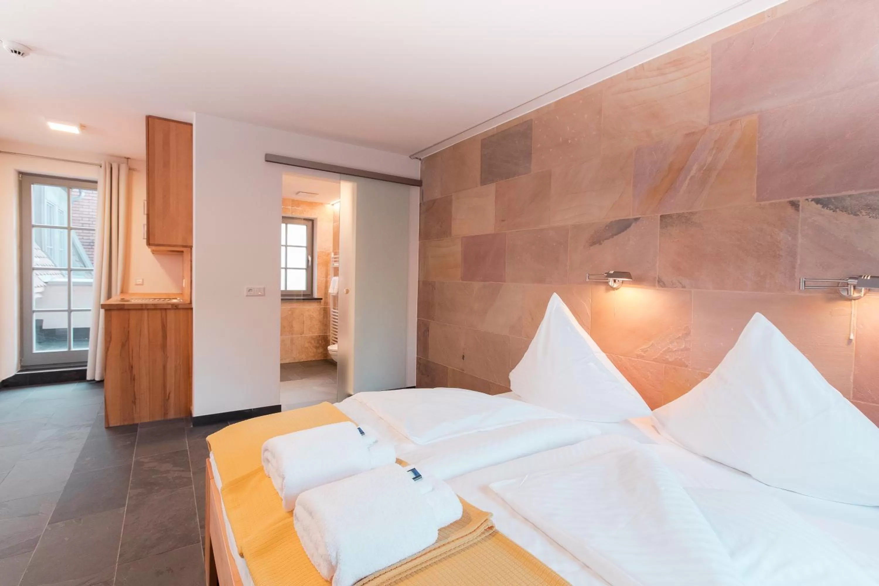 Photo of the whole room, Bed in Biohotel Kunstquartier