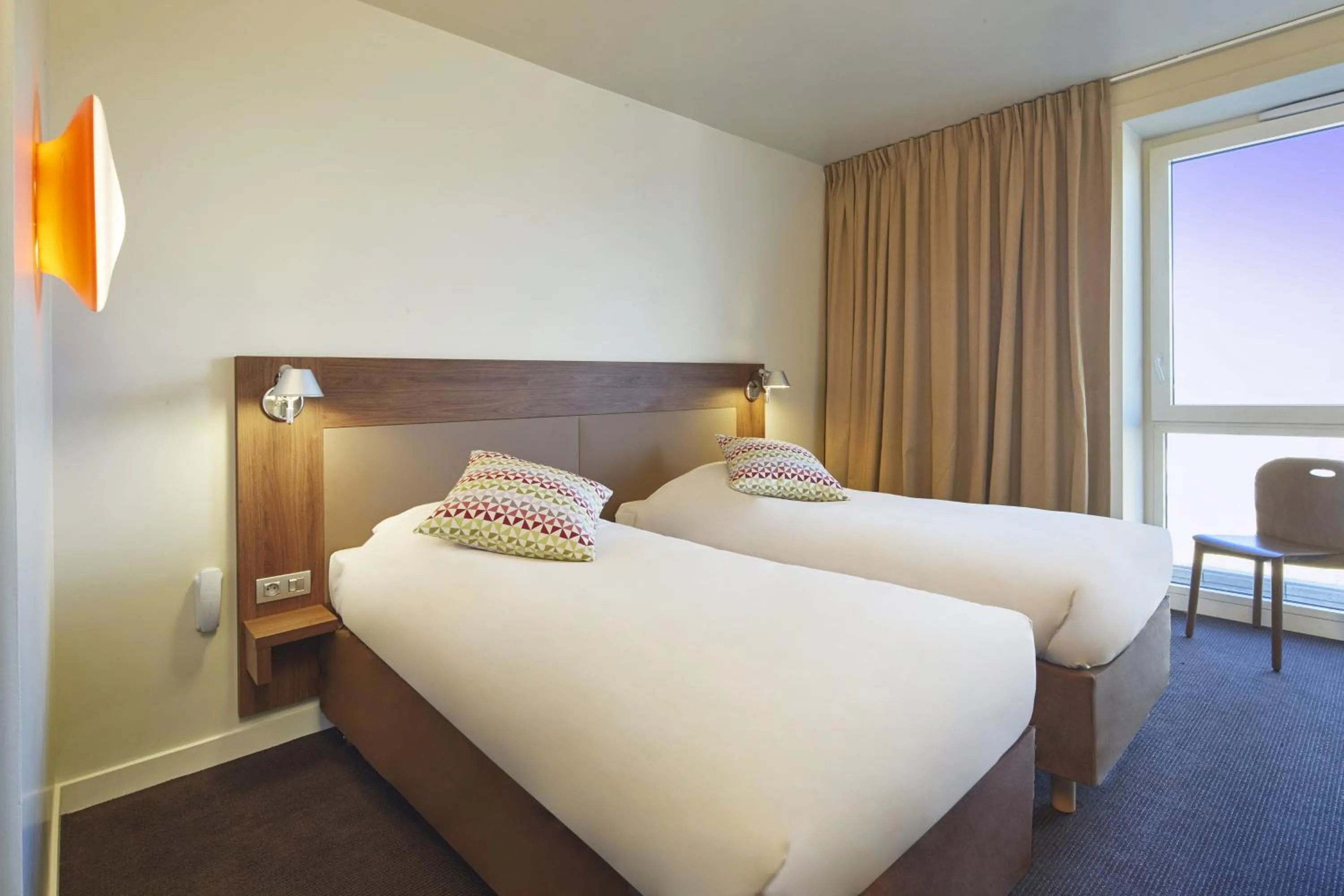 Photo of the whole room, Bed in Campanile PRIME - Paris Saclay