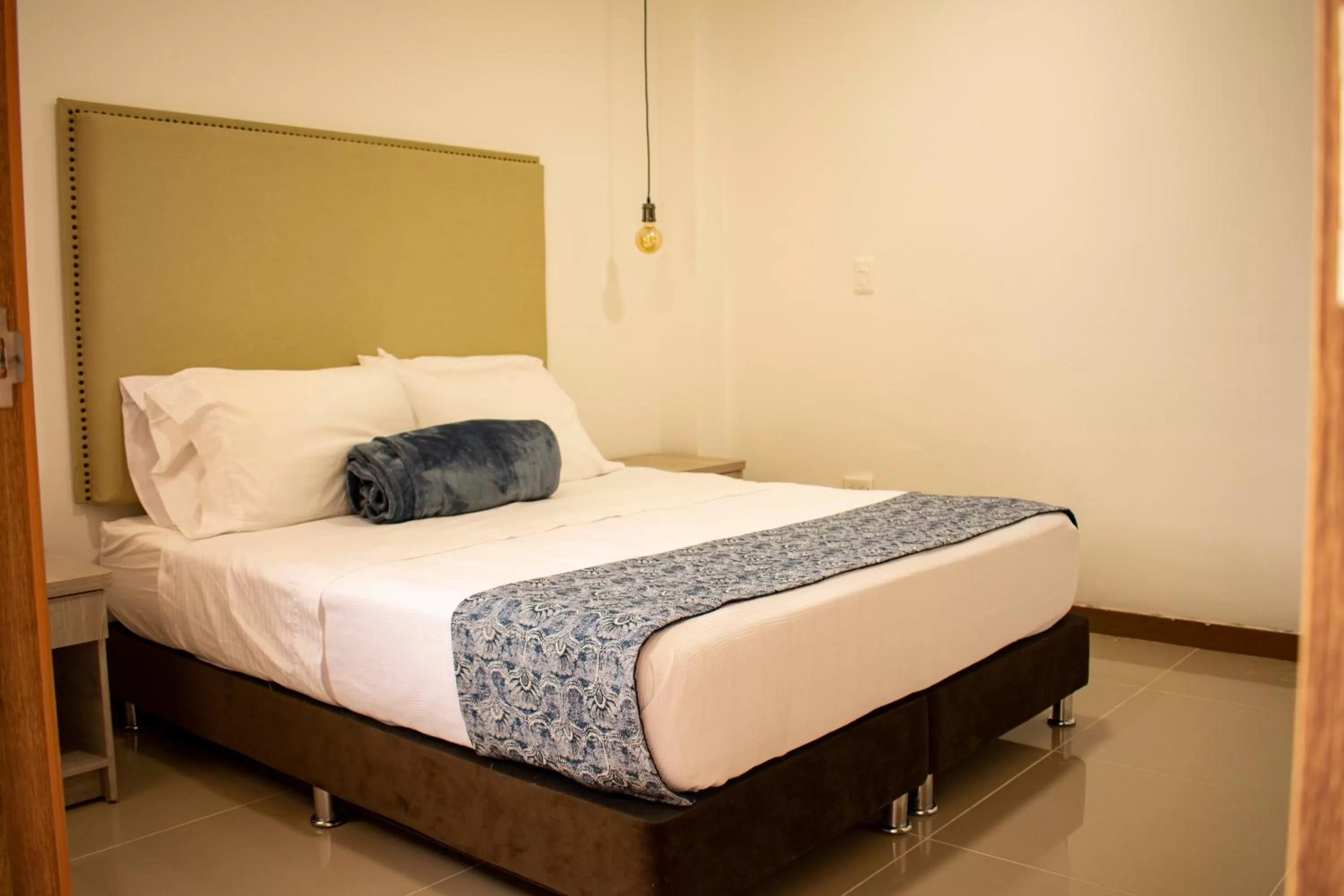 Bed in El Reloj Casa Hotel