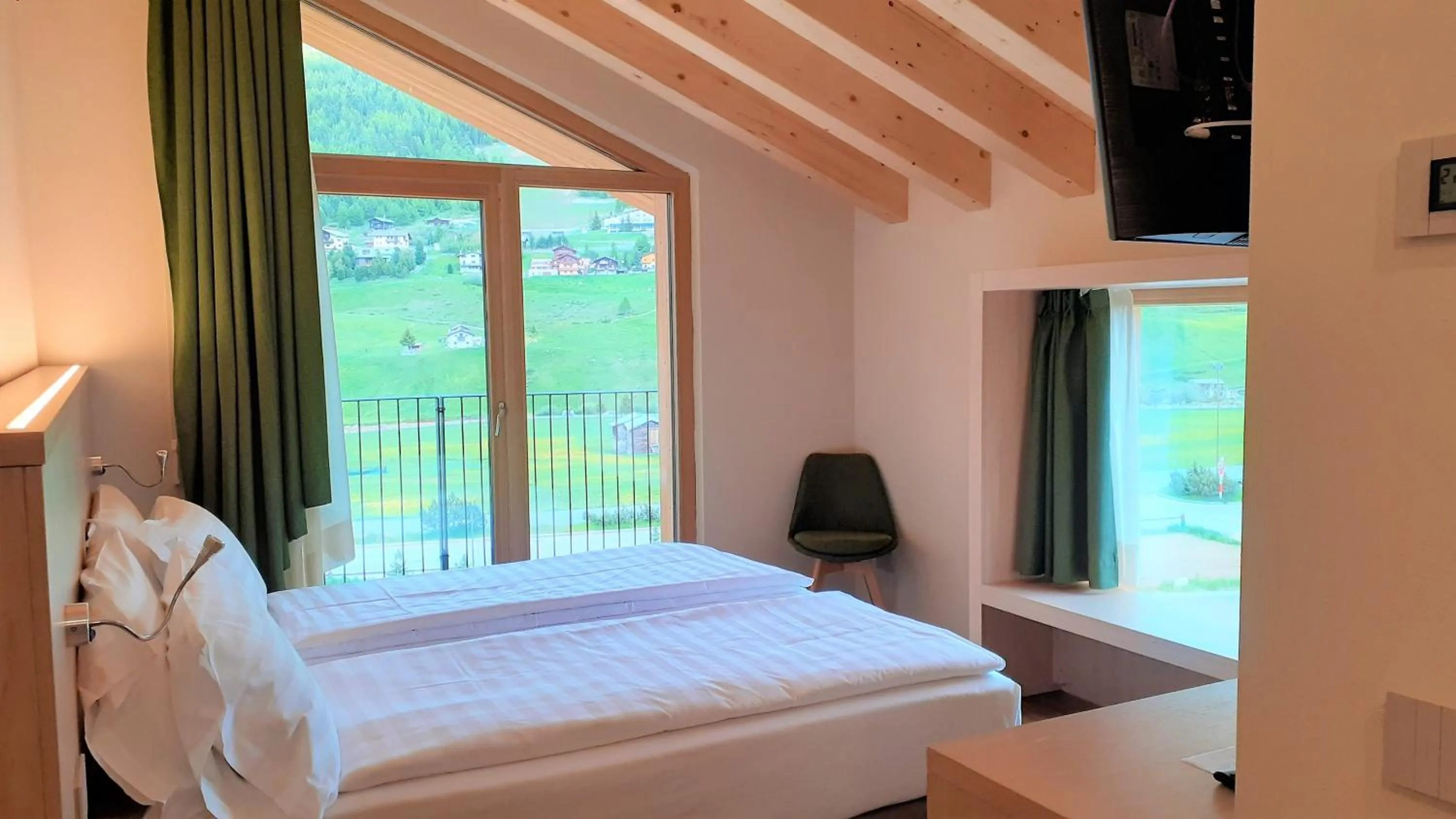 Bed in Livì Family Hotel