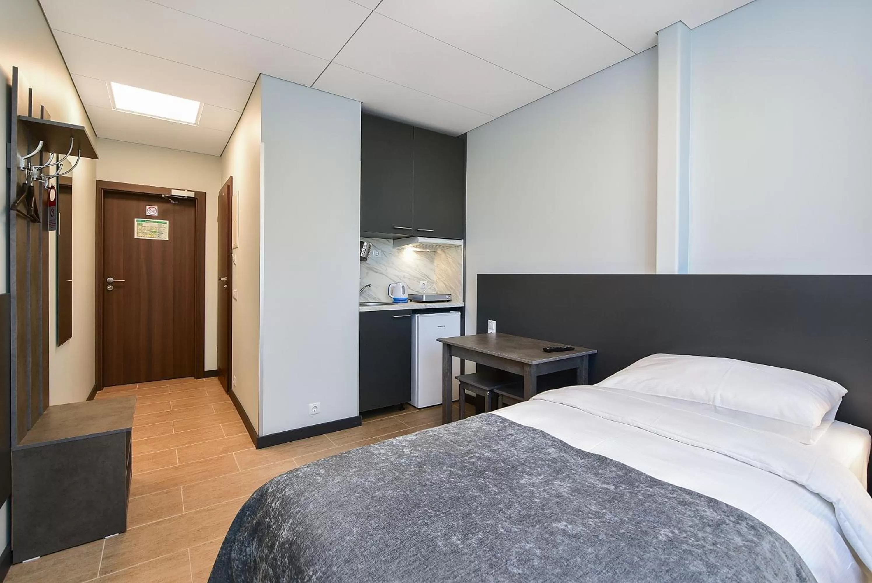 Bed in City Yard Inn Hotel