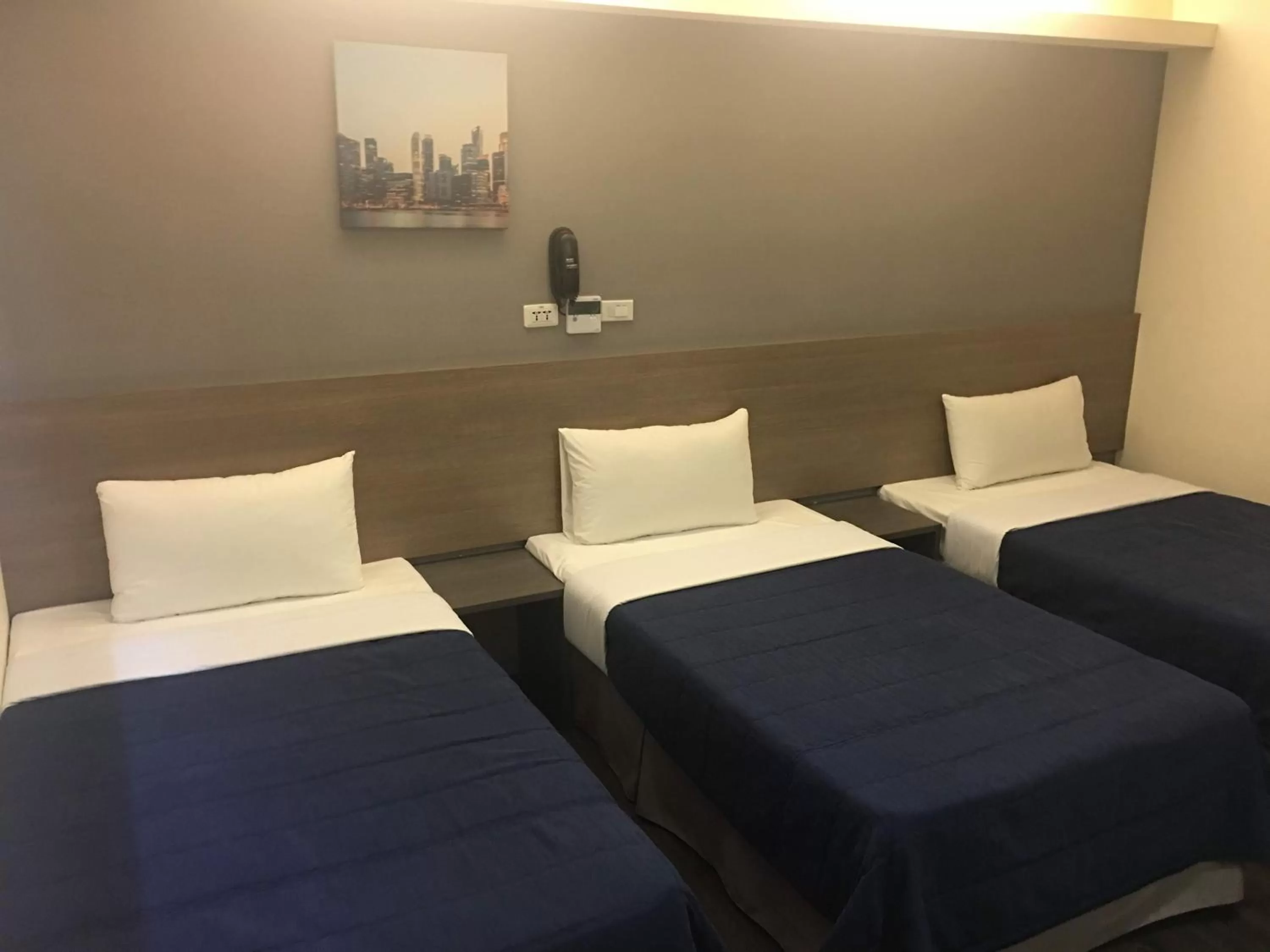 Bed in Bulowan Hotel