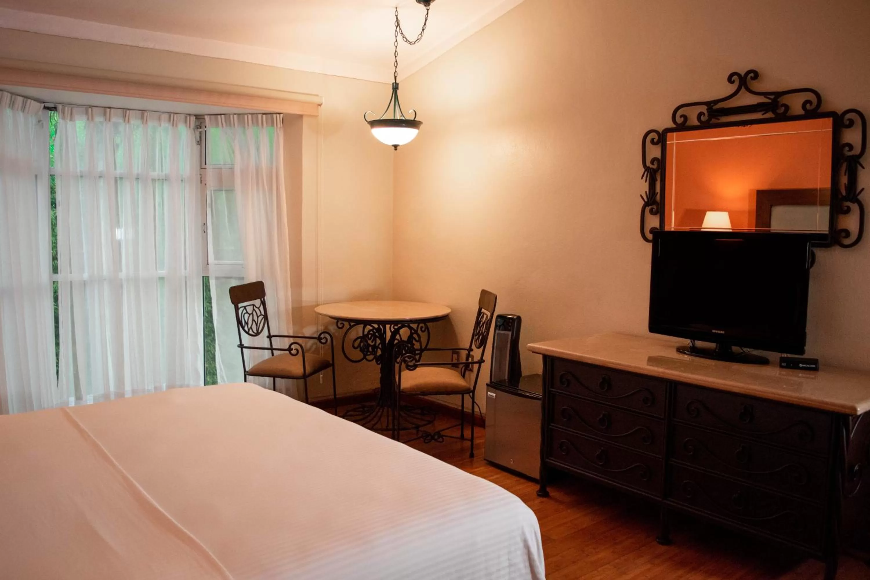 TV and multimedia, Bed in Hotel Villa Mercedes San Cristobal