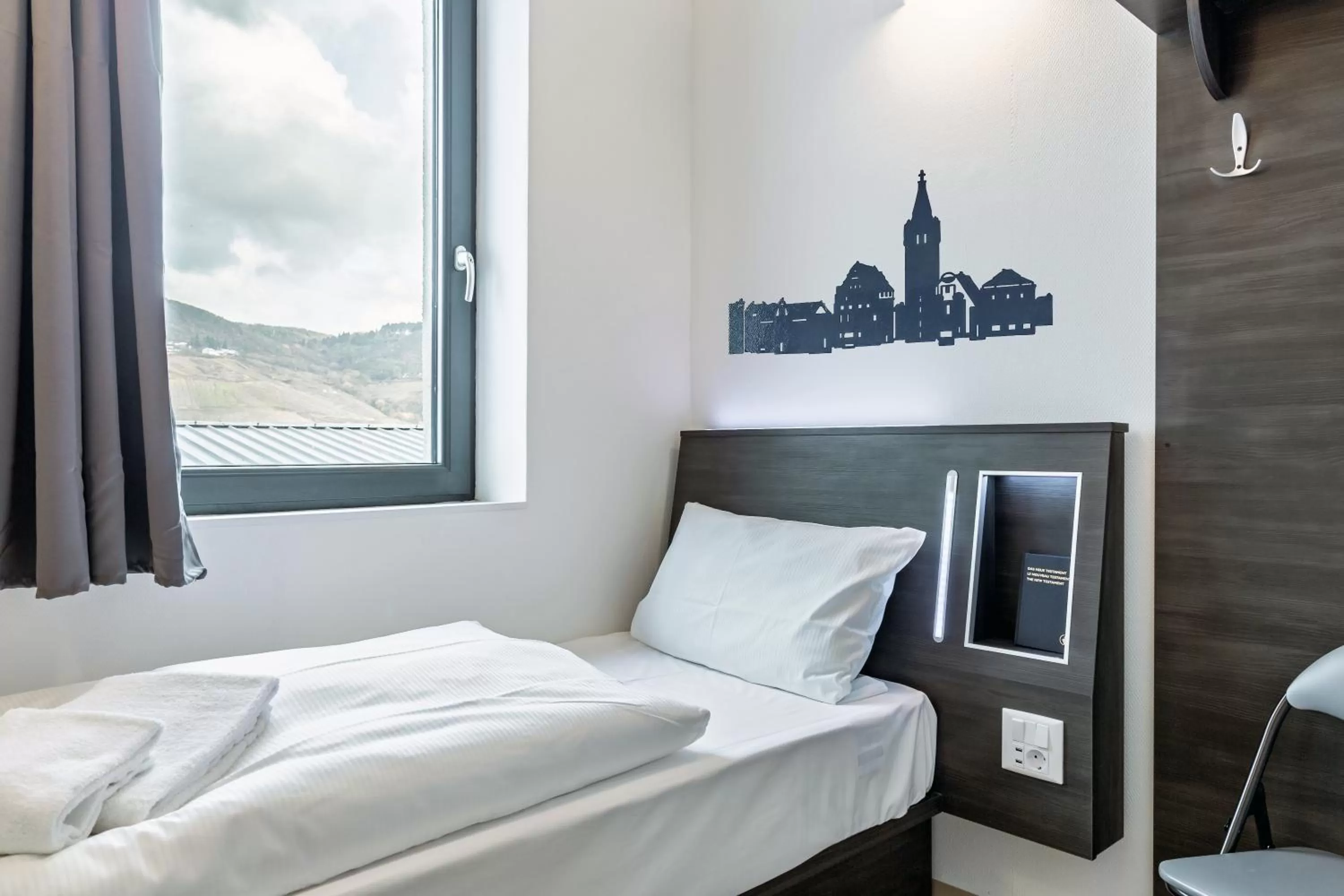 Bed in Augustus Hotel Bernkastel - Comfortable Budget Hotel