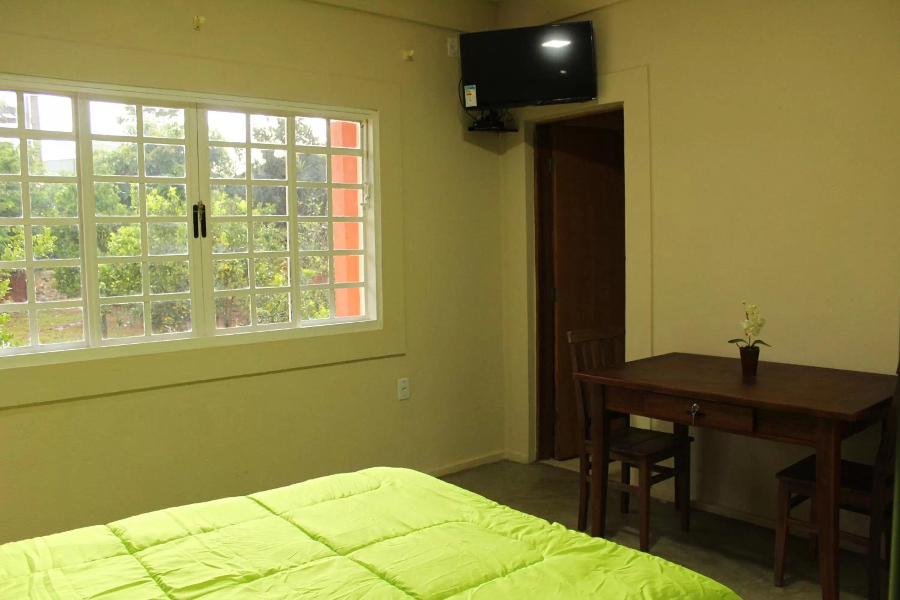 Bed in Pousada Morro dos Ventos