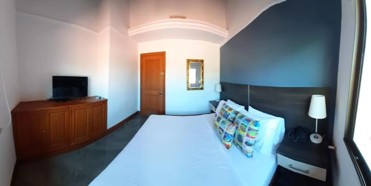 Photo of the whole room, TV/Entertainment Center in Porto Bello Hotel Boutique