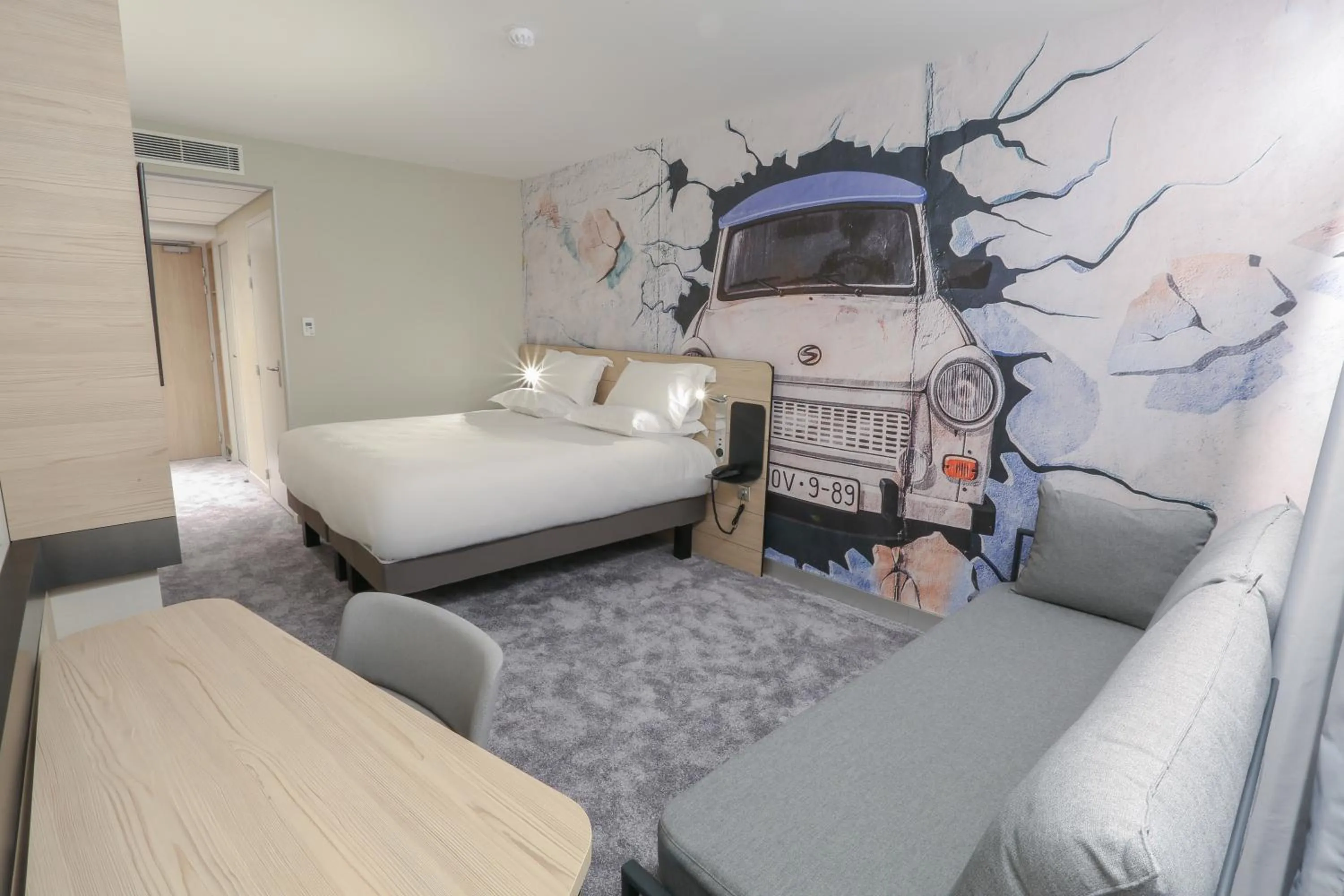 Bedroom in Arena Hotel La Defense