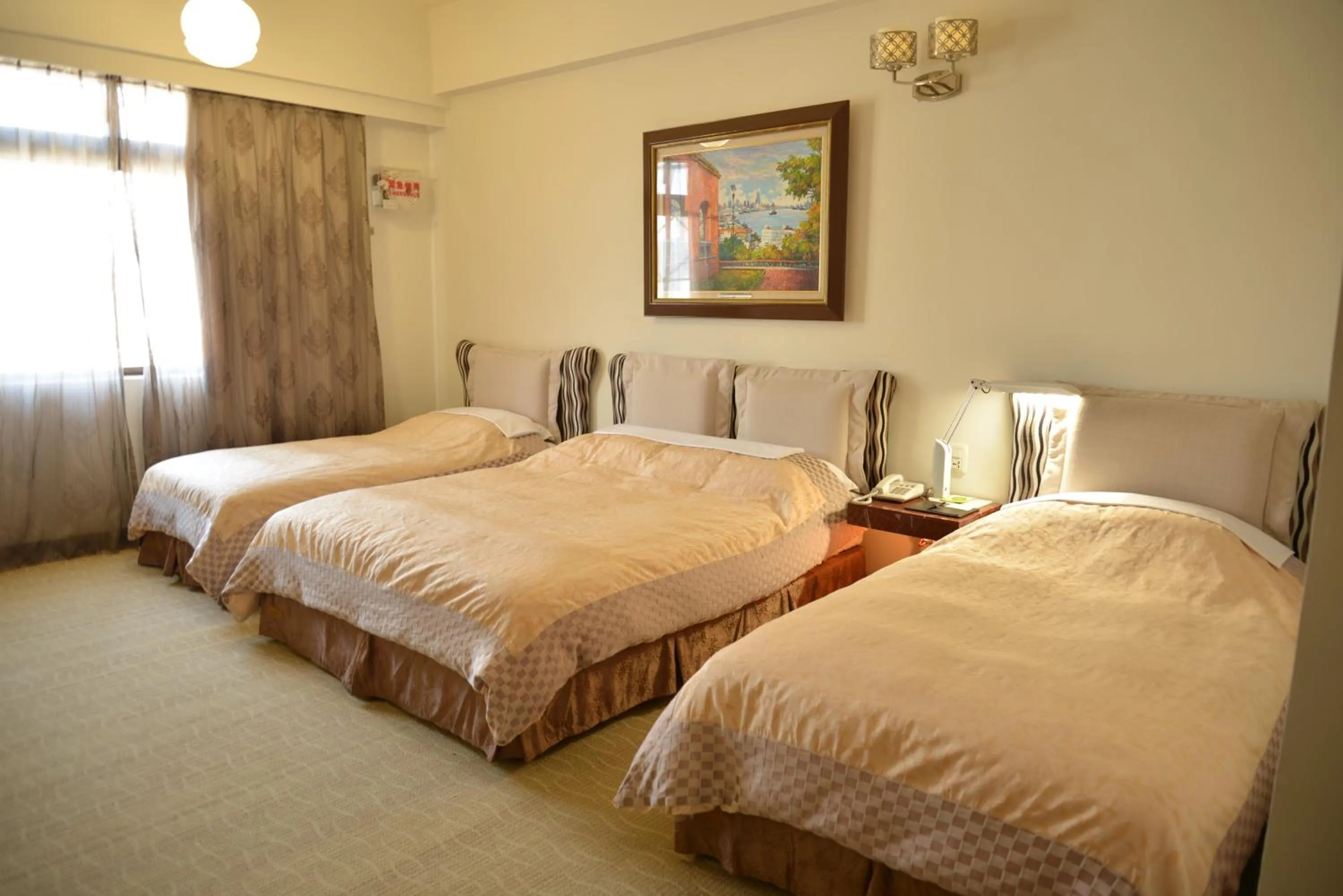 Bed in Kingship Hotel Kaohsiung Inter Continental