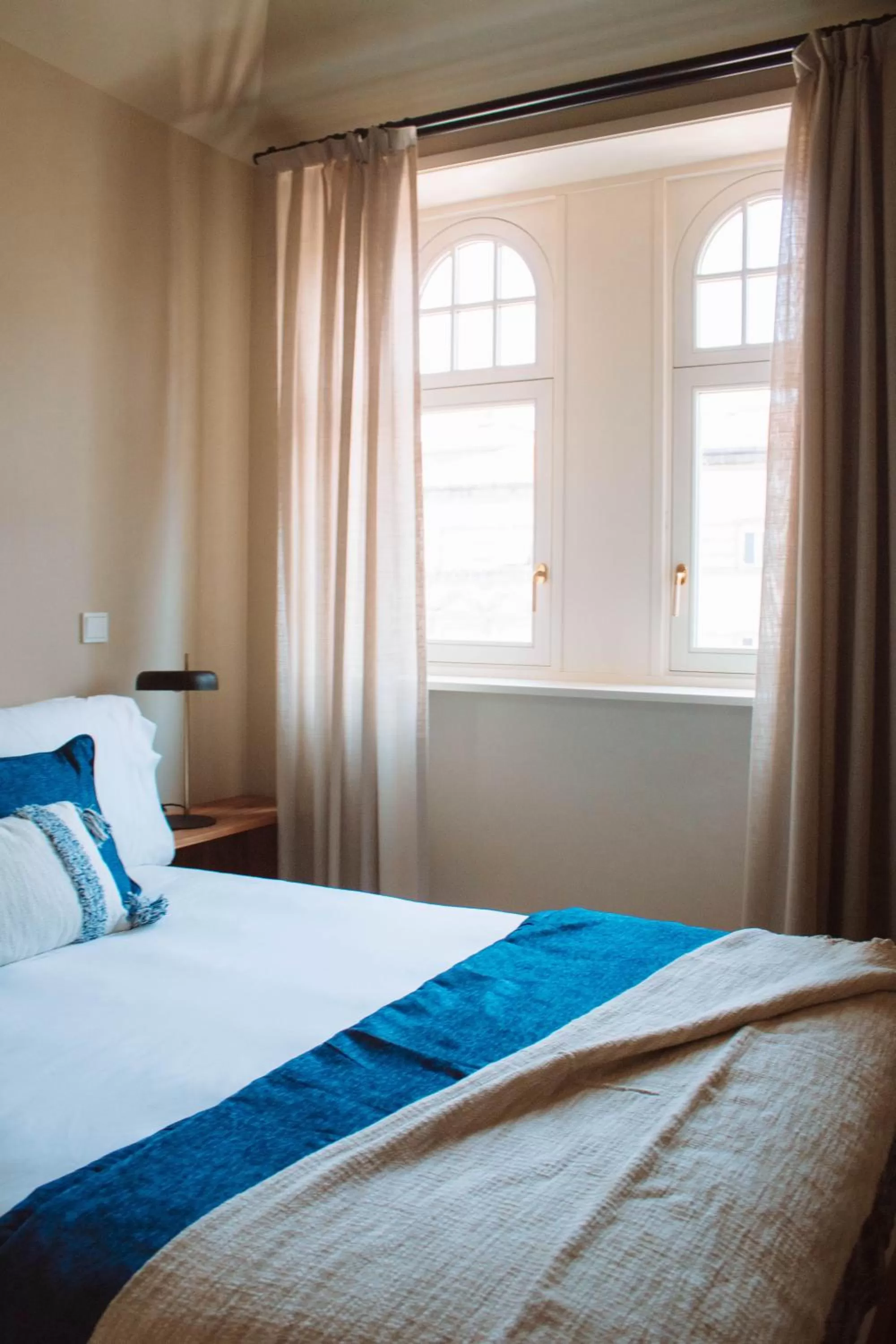 Bed in Villa Theatro Heritage Apartments