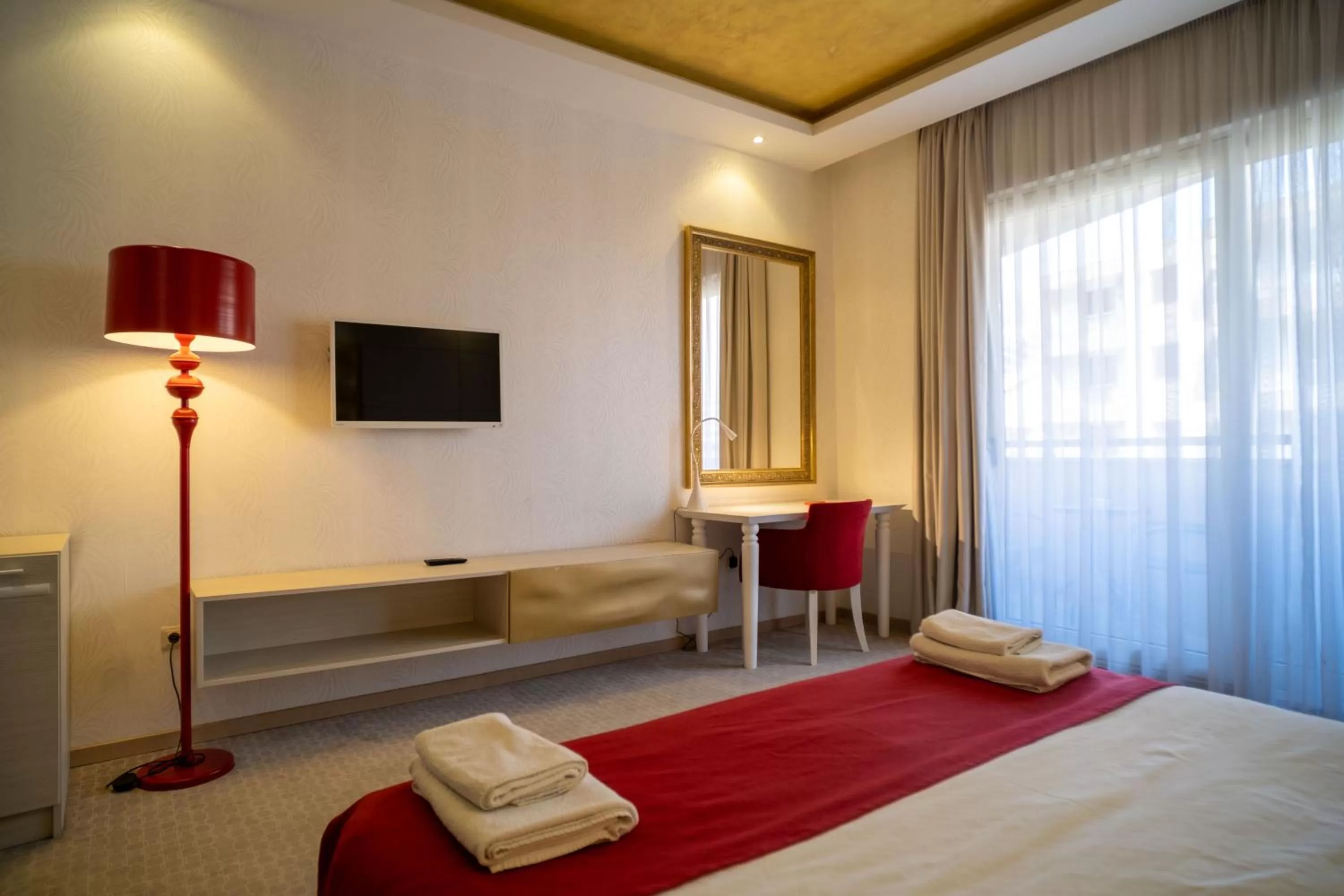 Photo of the whole room, TV/Entertainment Center in Hotel Atina