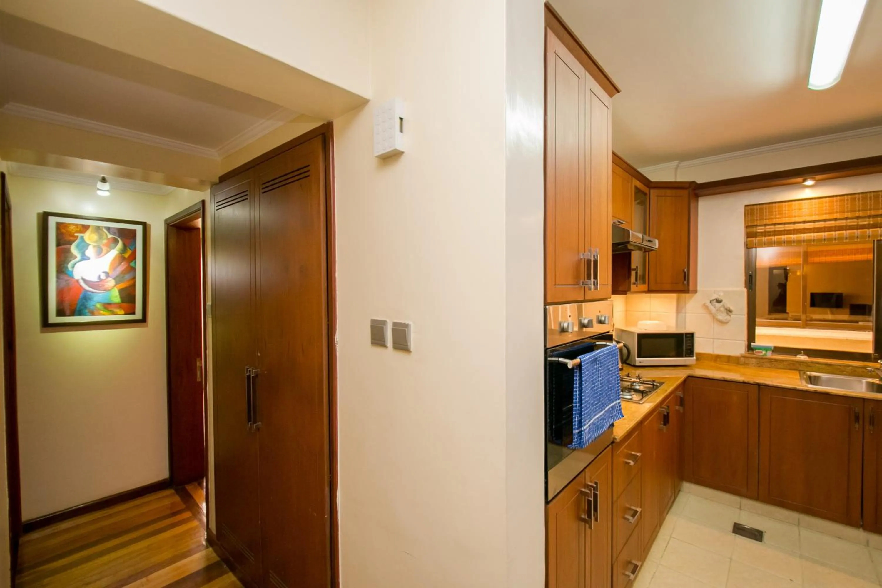 Kitchen or kitchenette in Waridi Paradise Hotel and Suites