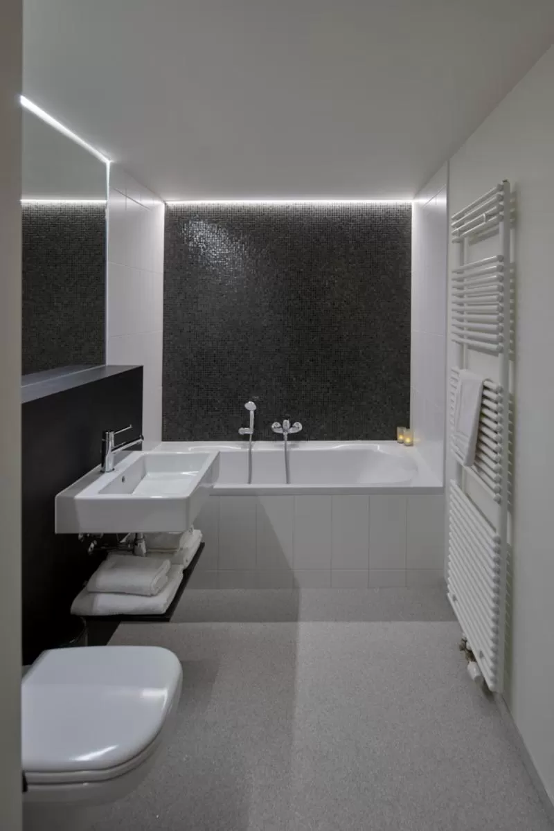 Bathroom in Alpha Hotel and Aparthotel