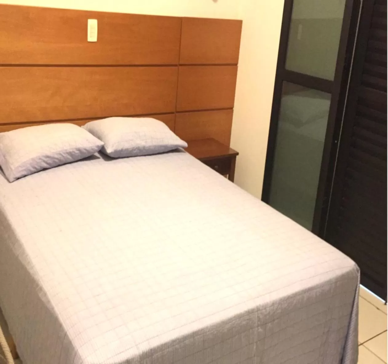 Bed in Pousada Ilha Vitoria