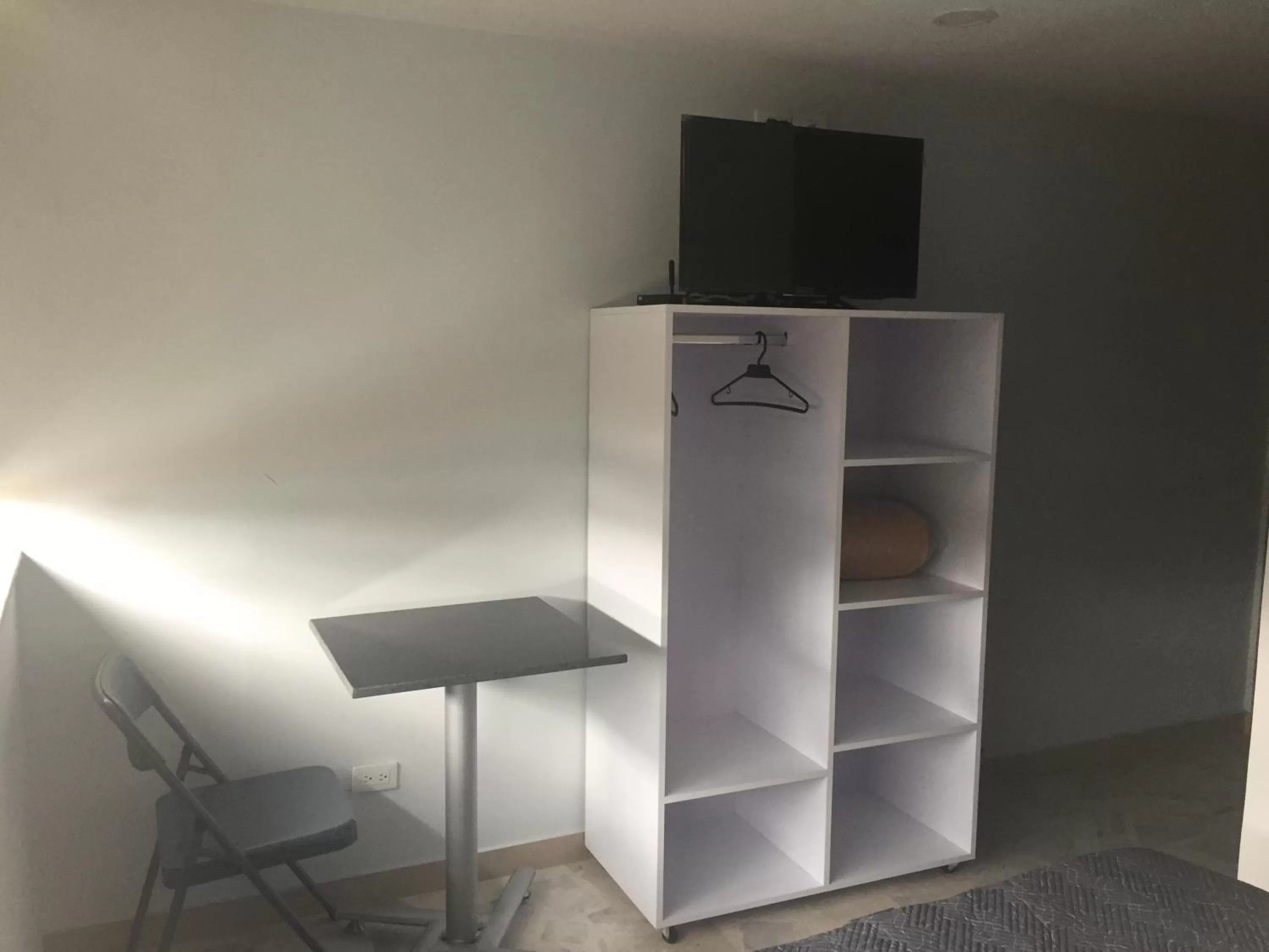 TV/Entertainment Center in Hotel Garden City Boutique