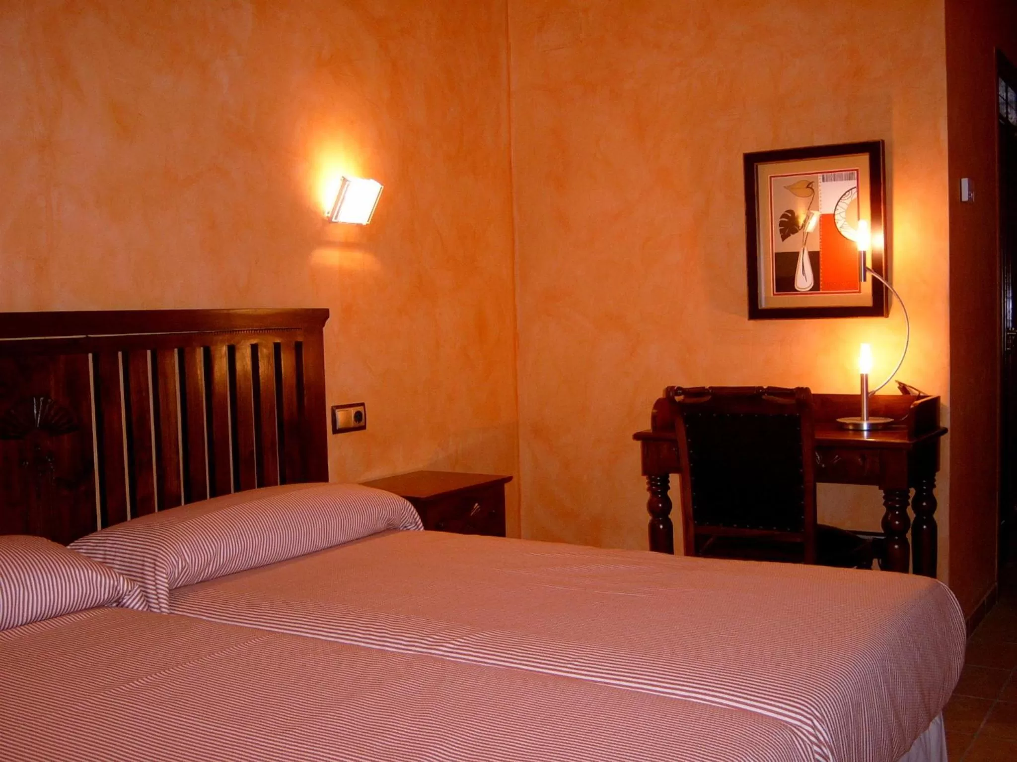 Bed in L'Agora Hotel