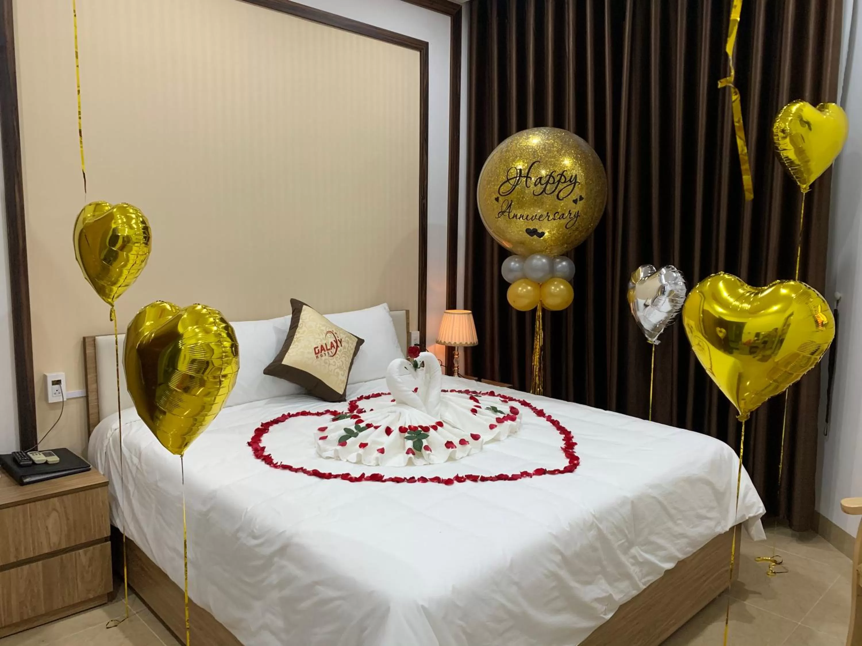 Bed in Galaxy Grand Hotel