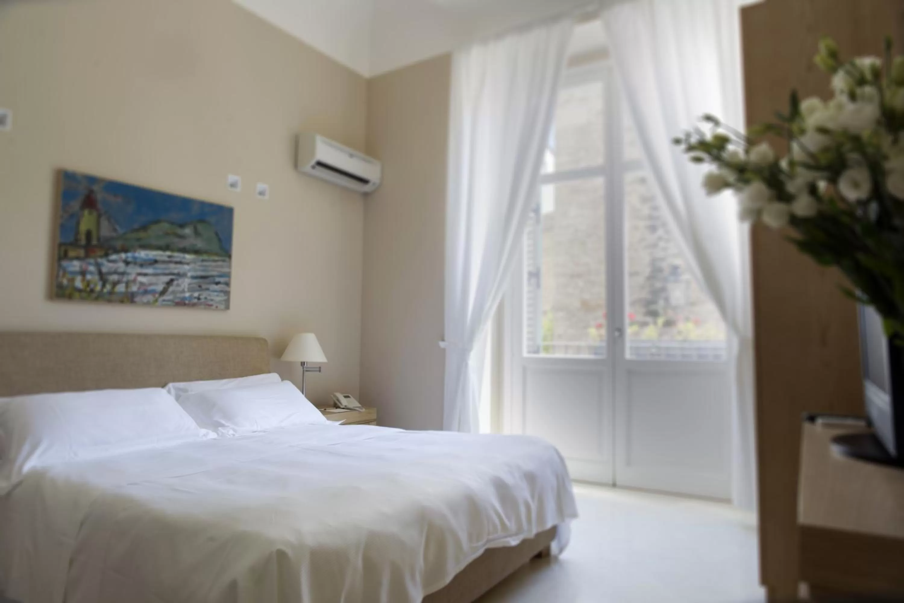 Bed in Palazzo Brunaccini Boutique Hotel