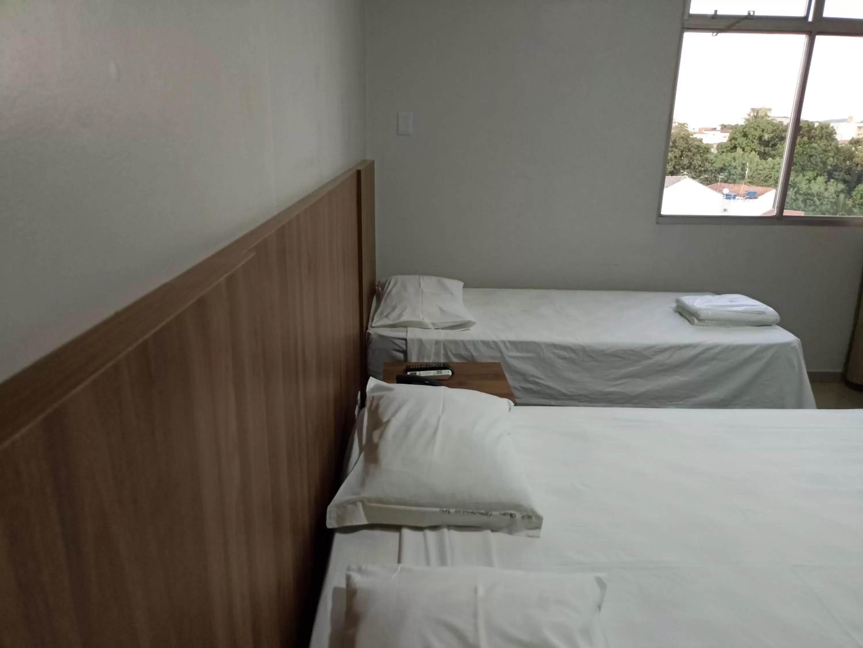 Bed in Hotel Oscar Econômico