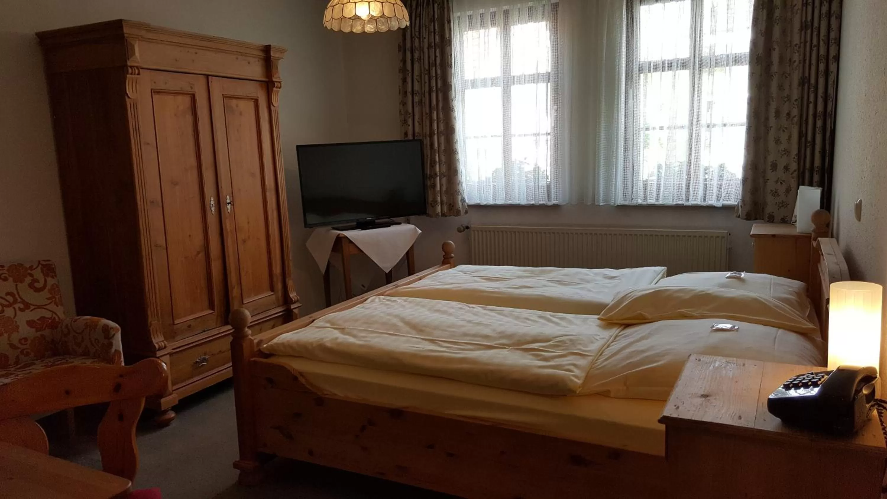 Photo of the whole room, Bed in Hotel Goldflair am Rathaus