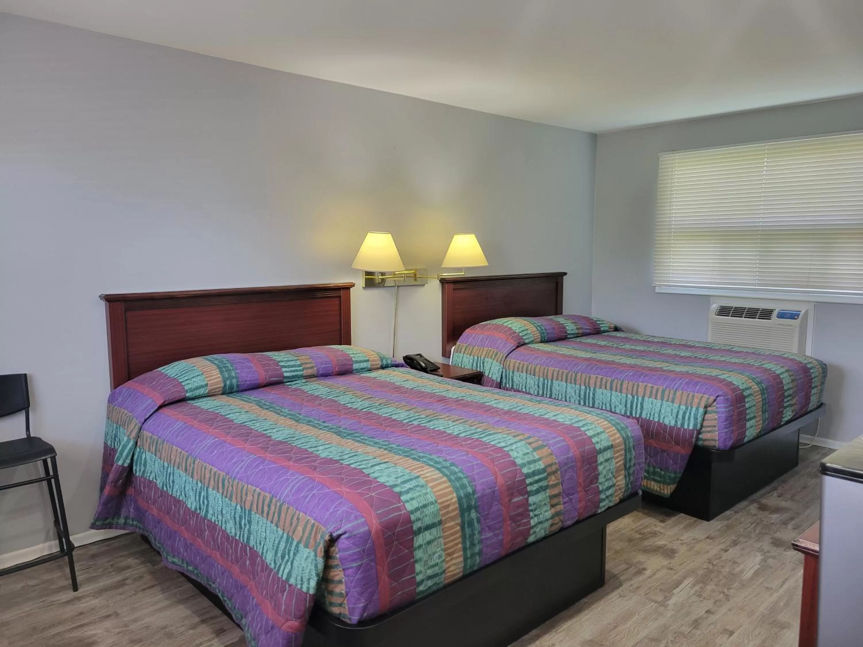 Bed in Knights Inn Cobourg