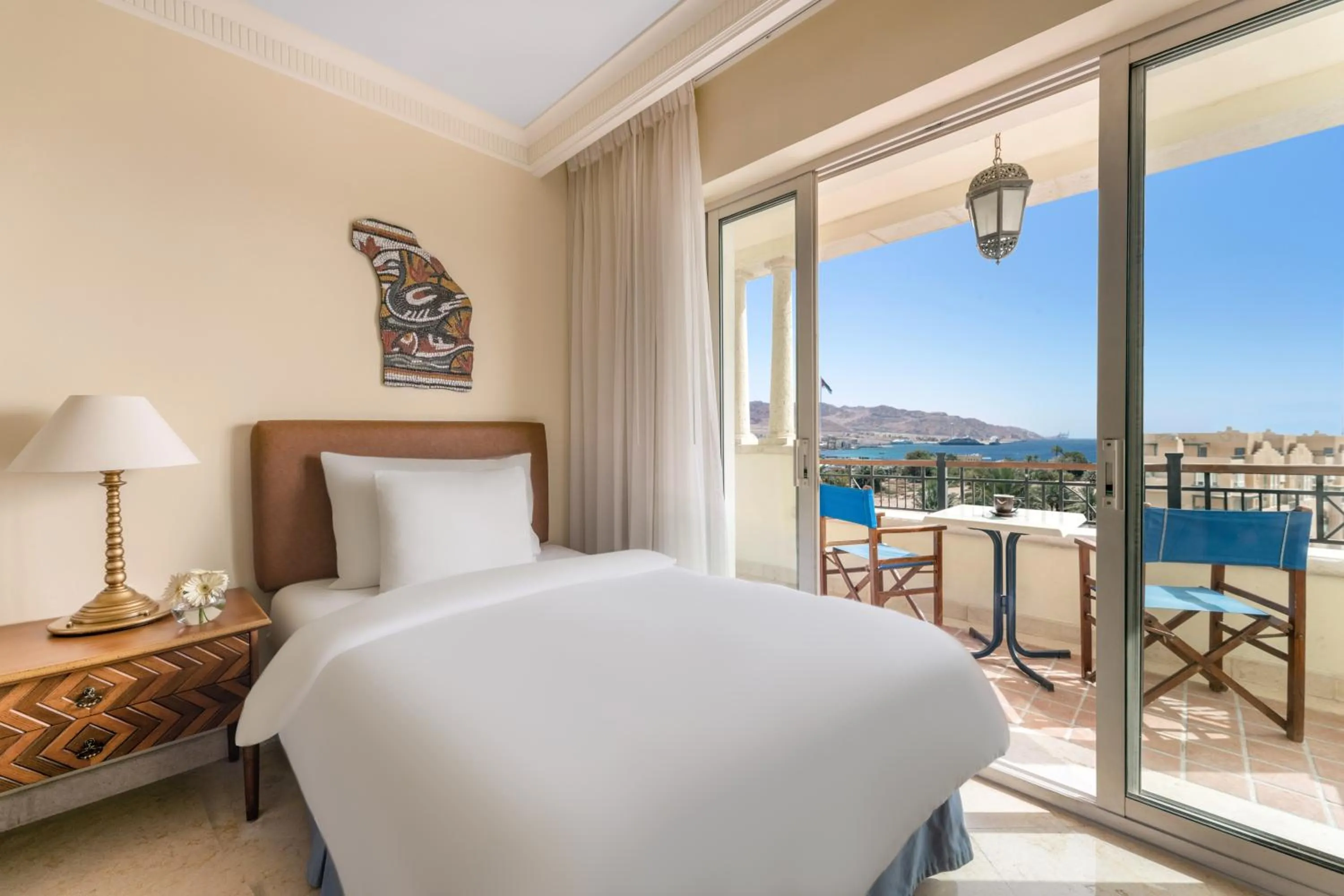 Balcony/Terrace, Bed in Mövenpick Resort & Residences Aqaba