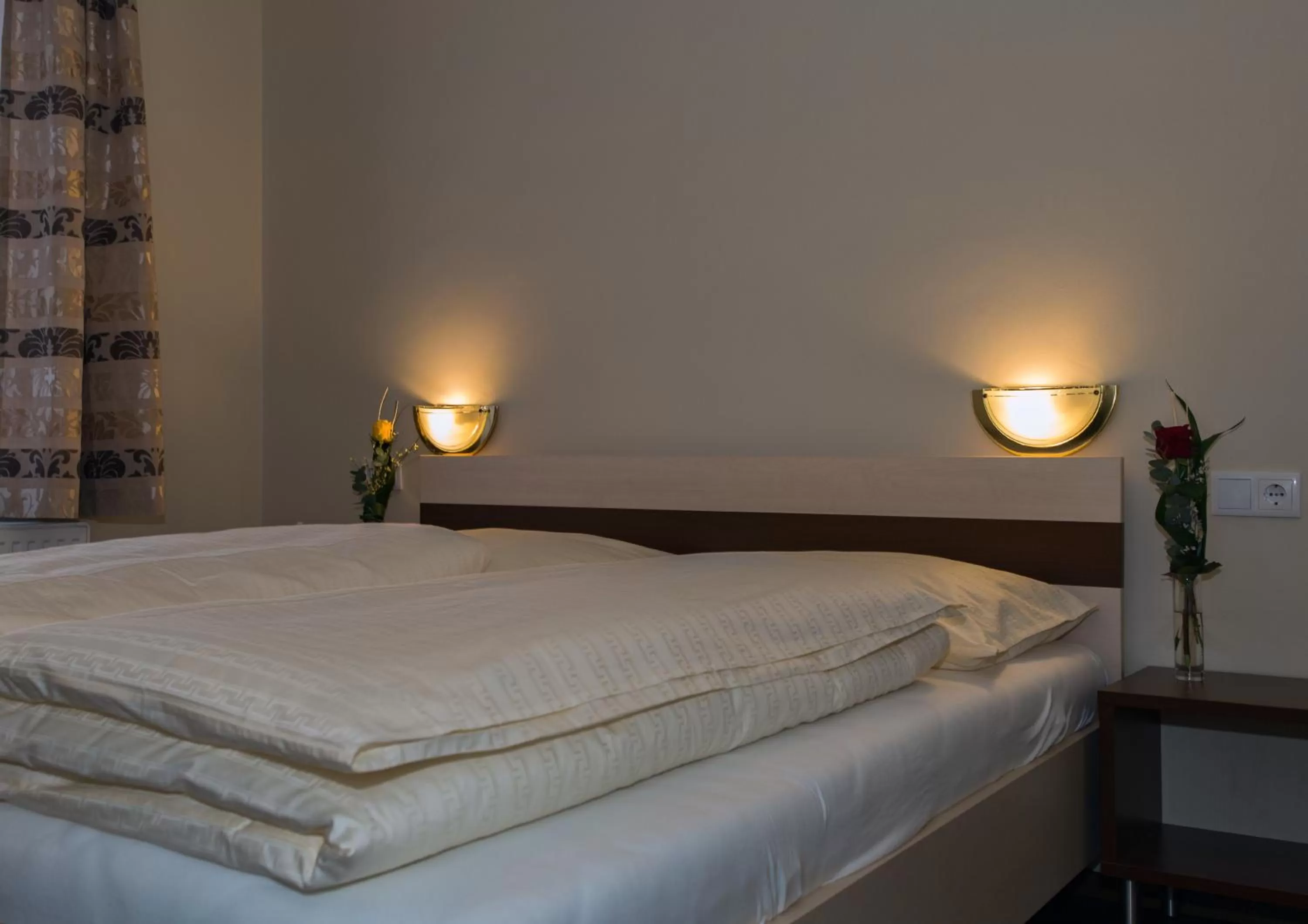 Bed in Hotel Guidassoni