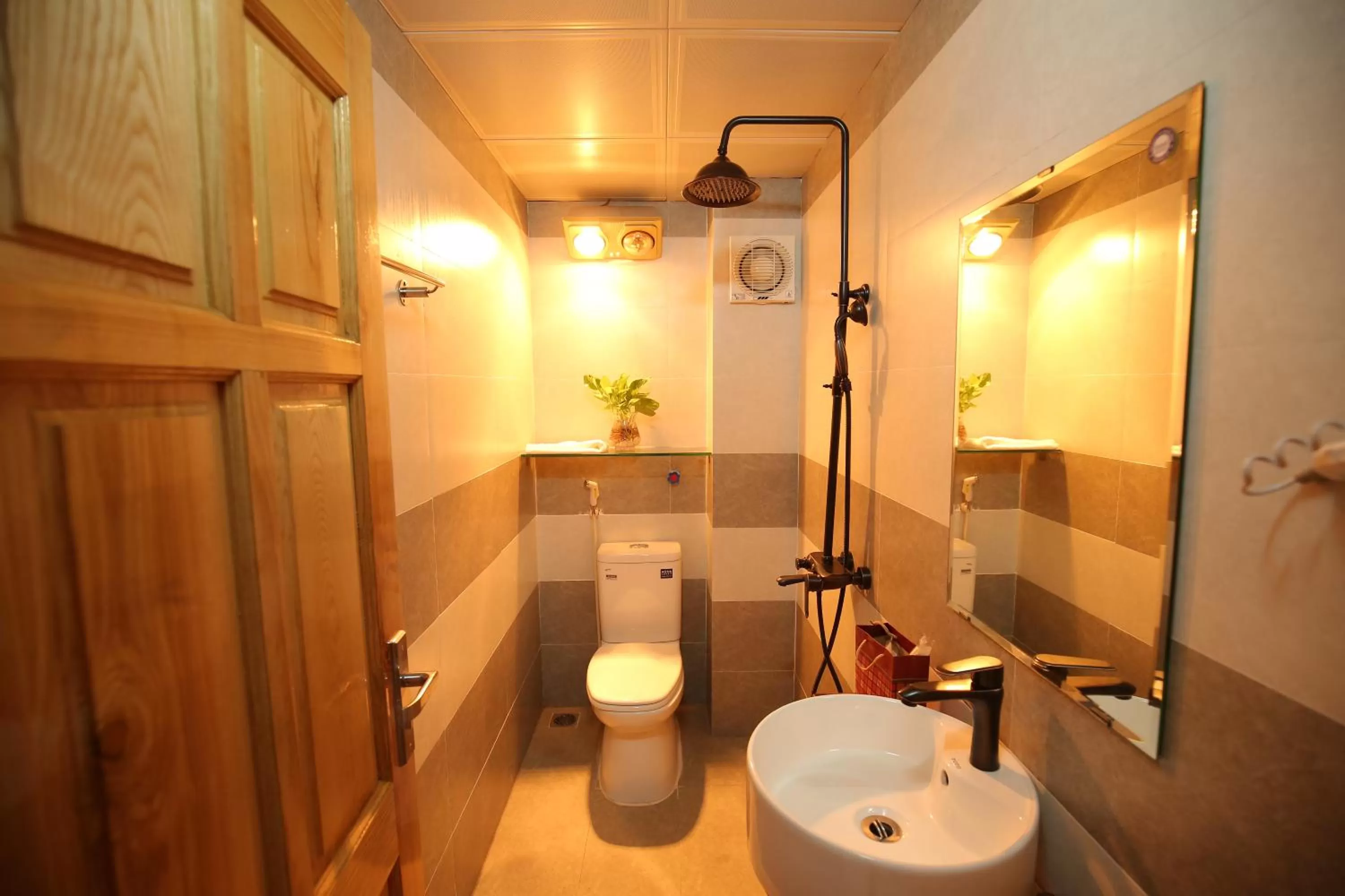 Bathroom in Cozynibi Hotel