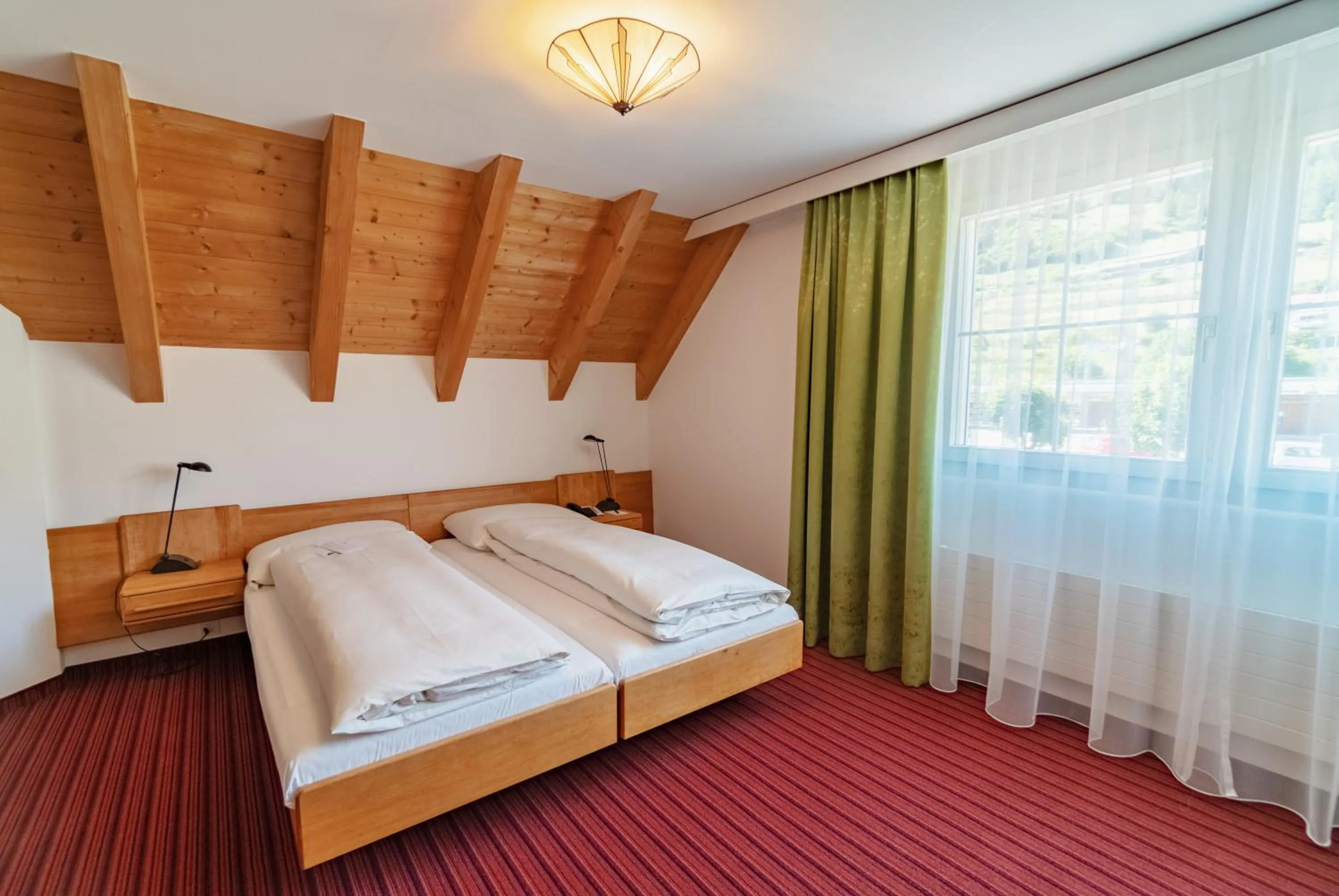 Bedroom, Bed in Typically Swiss Hotel Altana