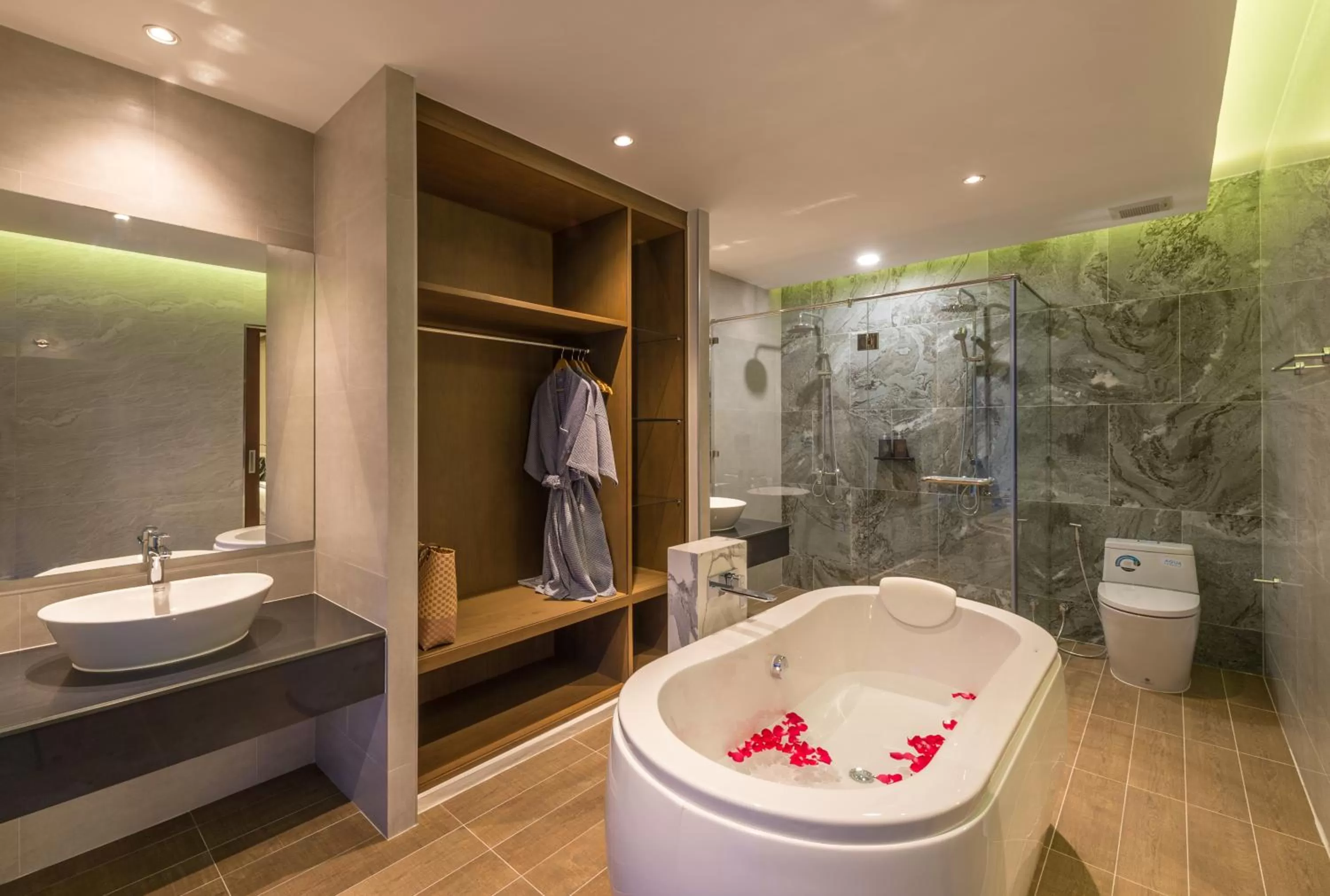 Shower in Cher​mantra​ Aonang​ Resort & Pool​ Suite