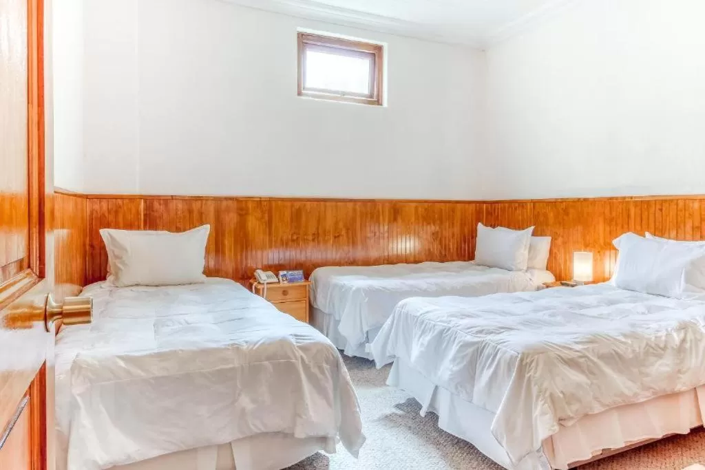 Bed in CHALET CHAPITAL Punta Arenas