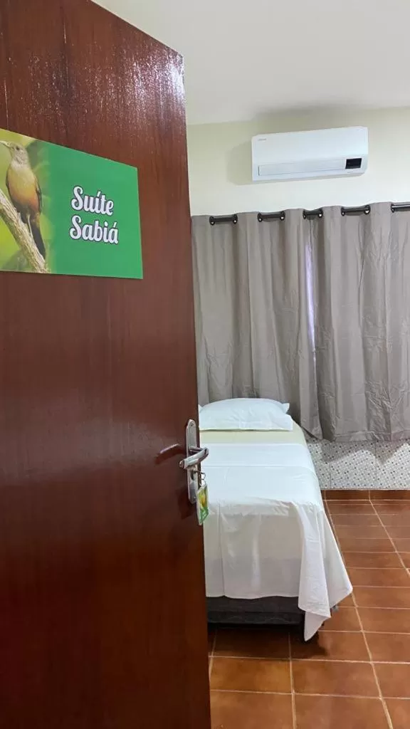 Bed in Pousada Casa Grande