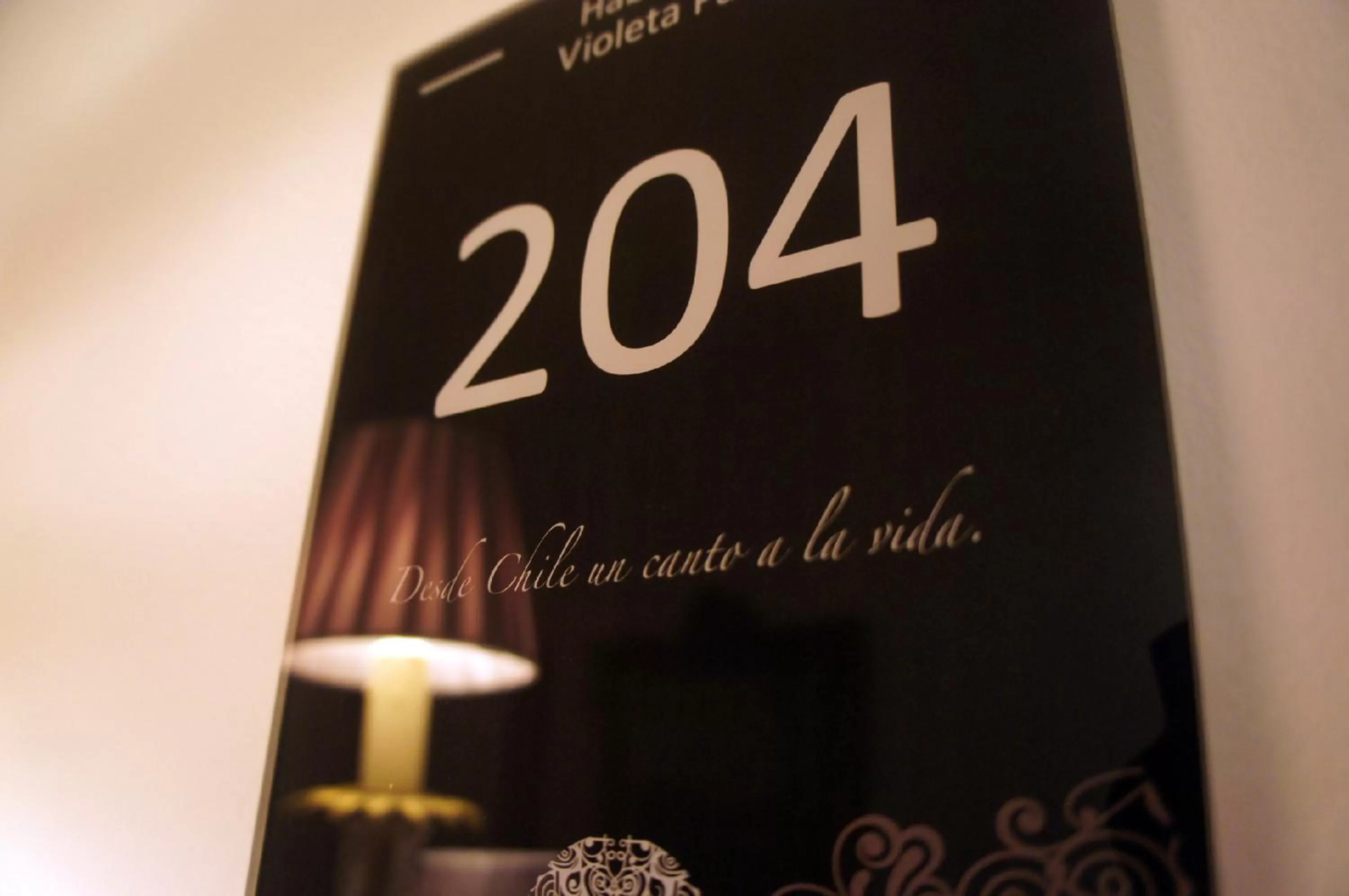 Text overlay in Quiral Hotel Boutique