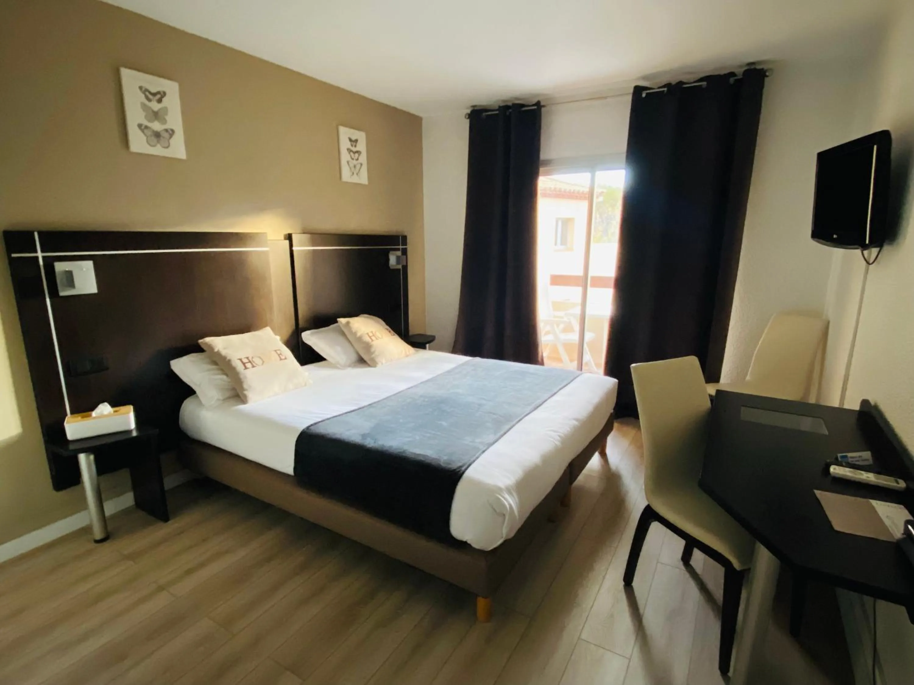 View (from property/room), Bed in Le Floréal