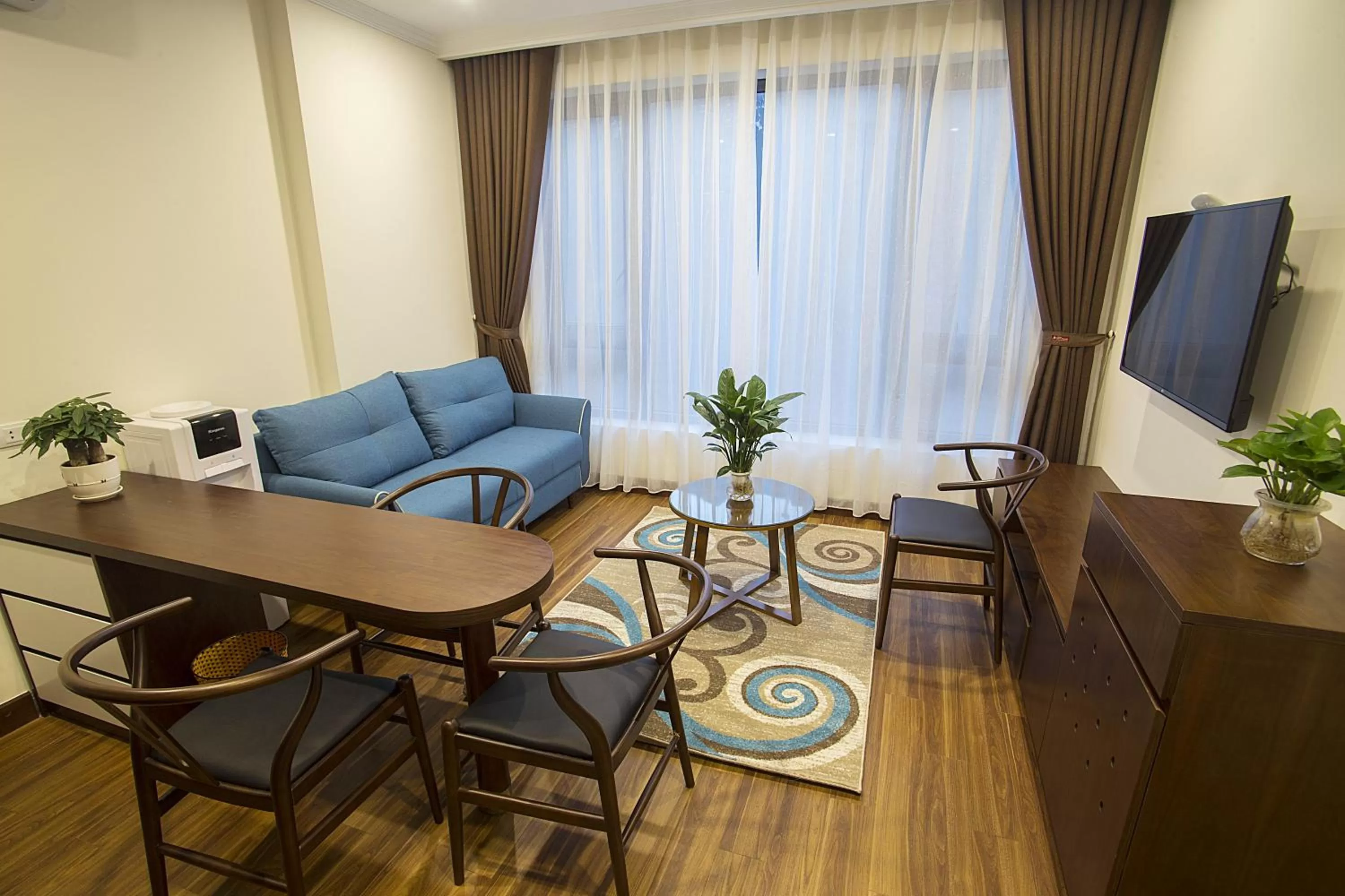 Communal lounge/ TV room in Newsky Serviced Apartment