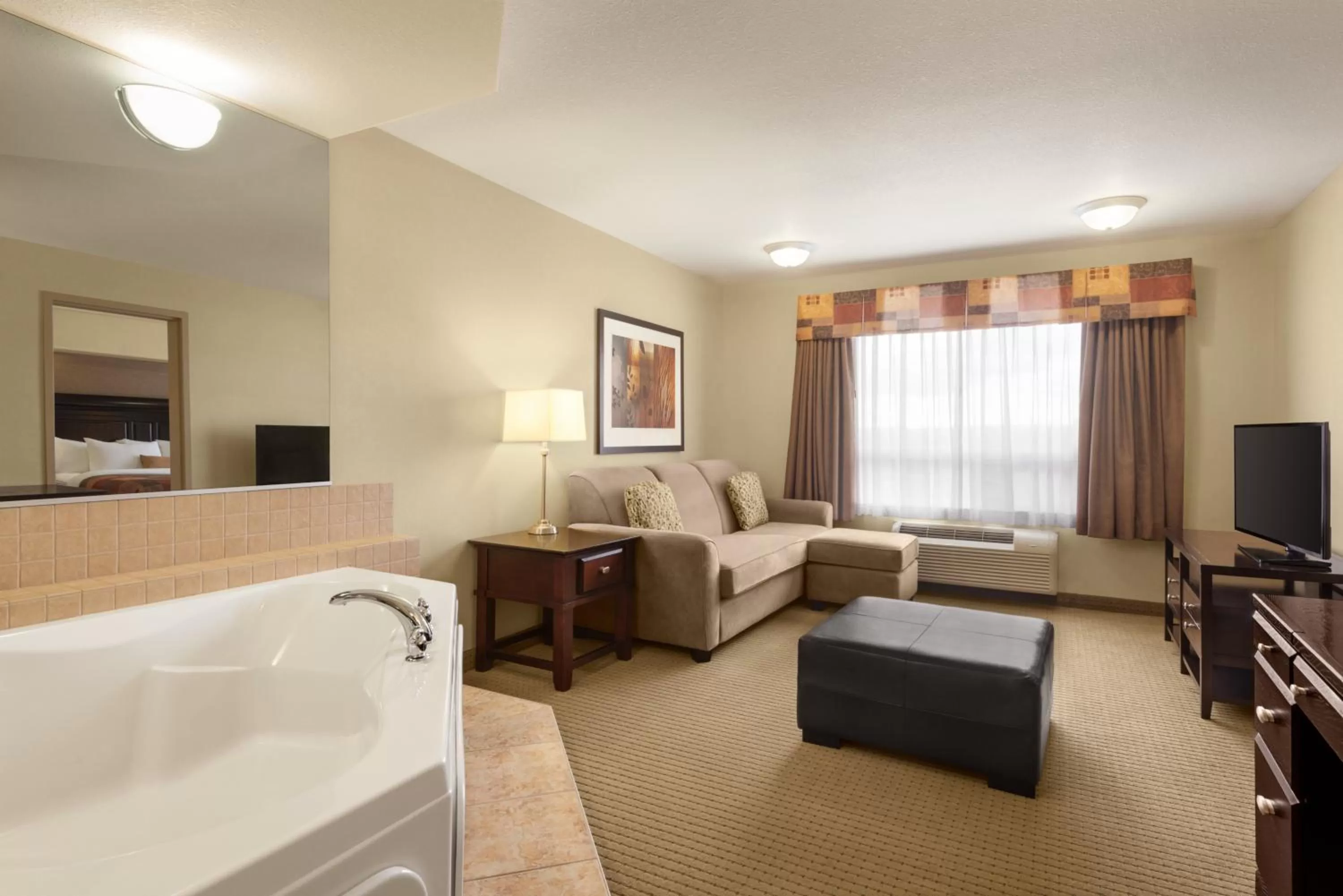 Living room, Bed in Ramada by Wyndham Drayton Valley