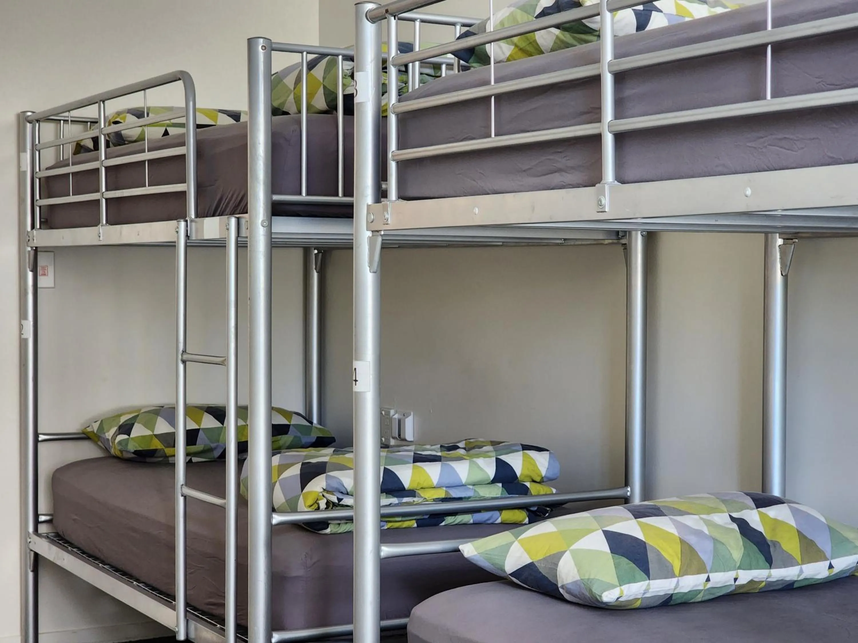 Bed in Newton Lodge Auckland