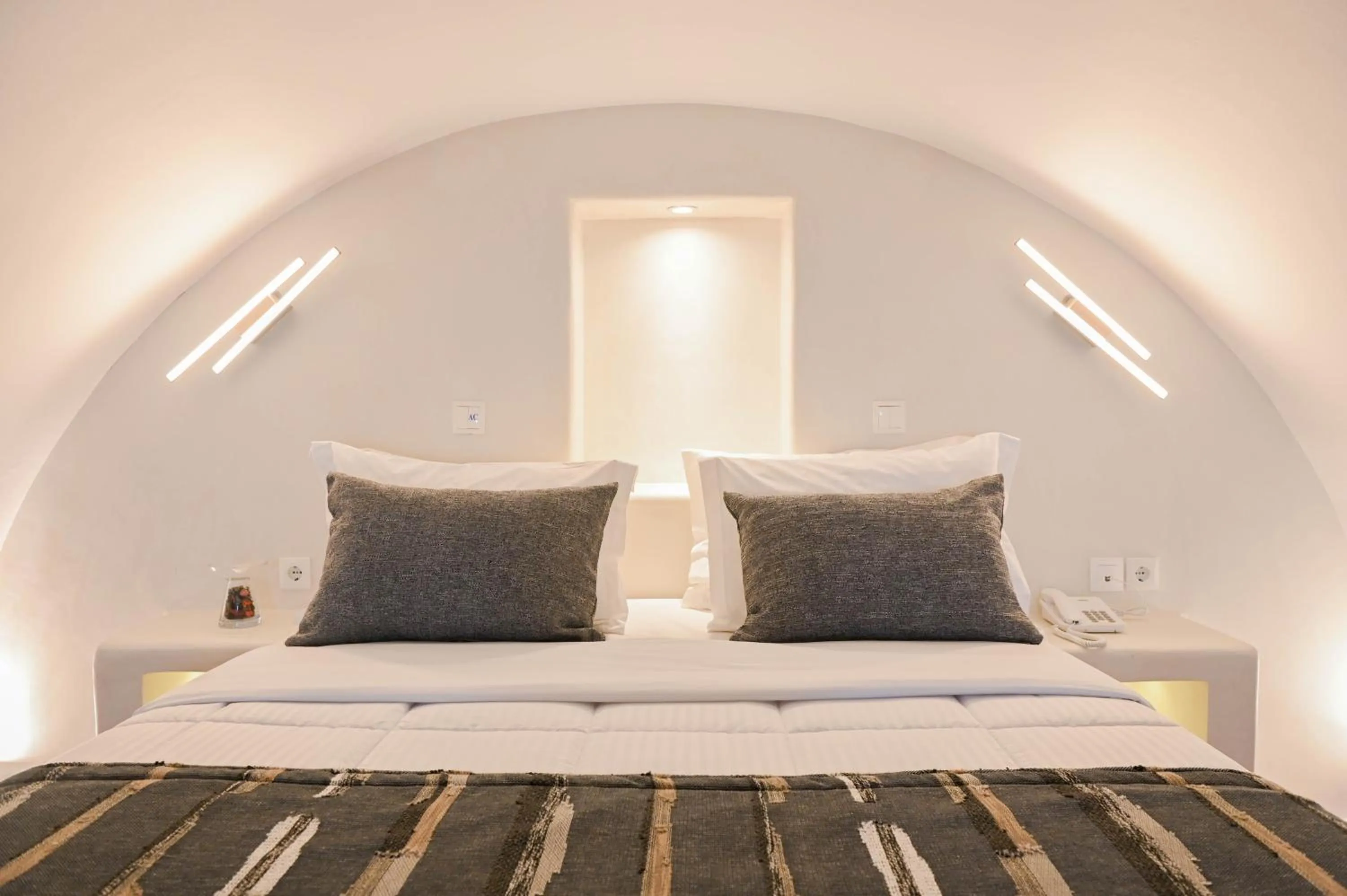 Bed in Amerisa Suites & Villa