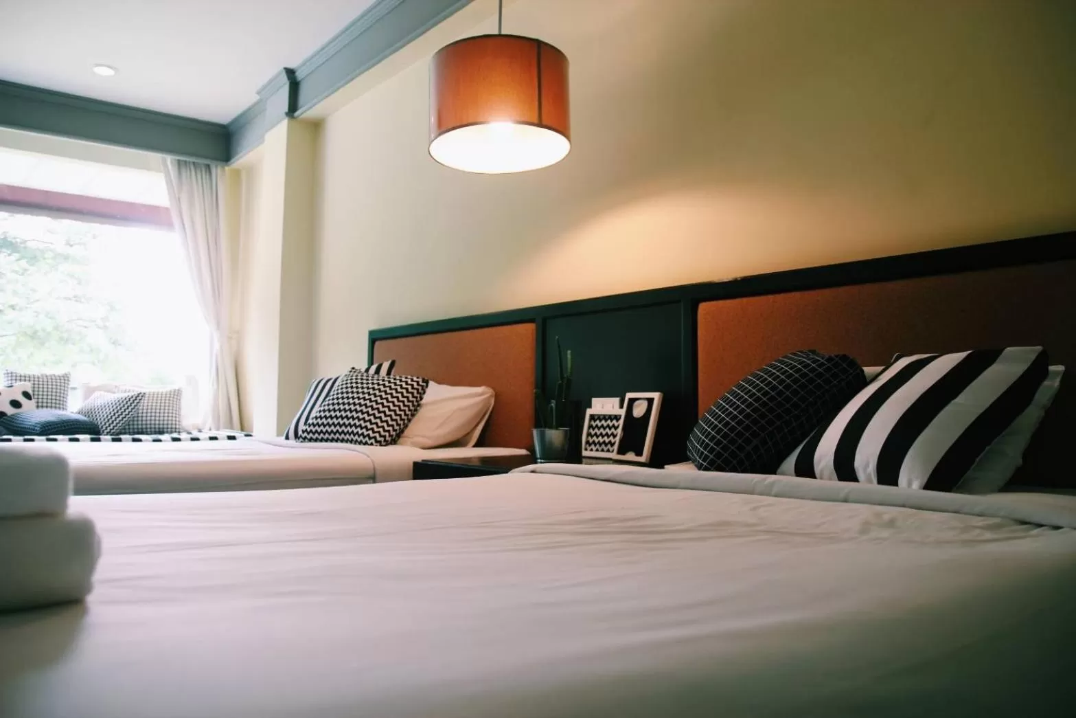 Bed in Aekpailin River Kwai Resort